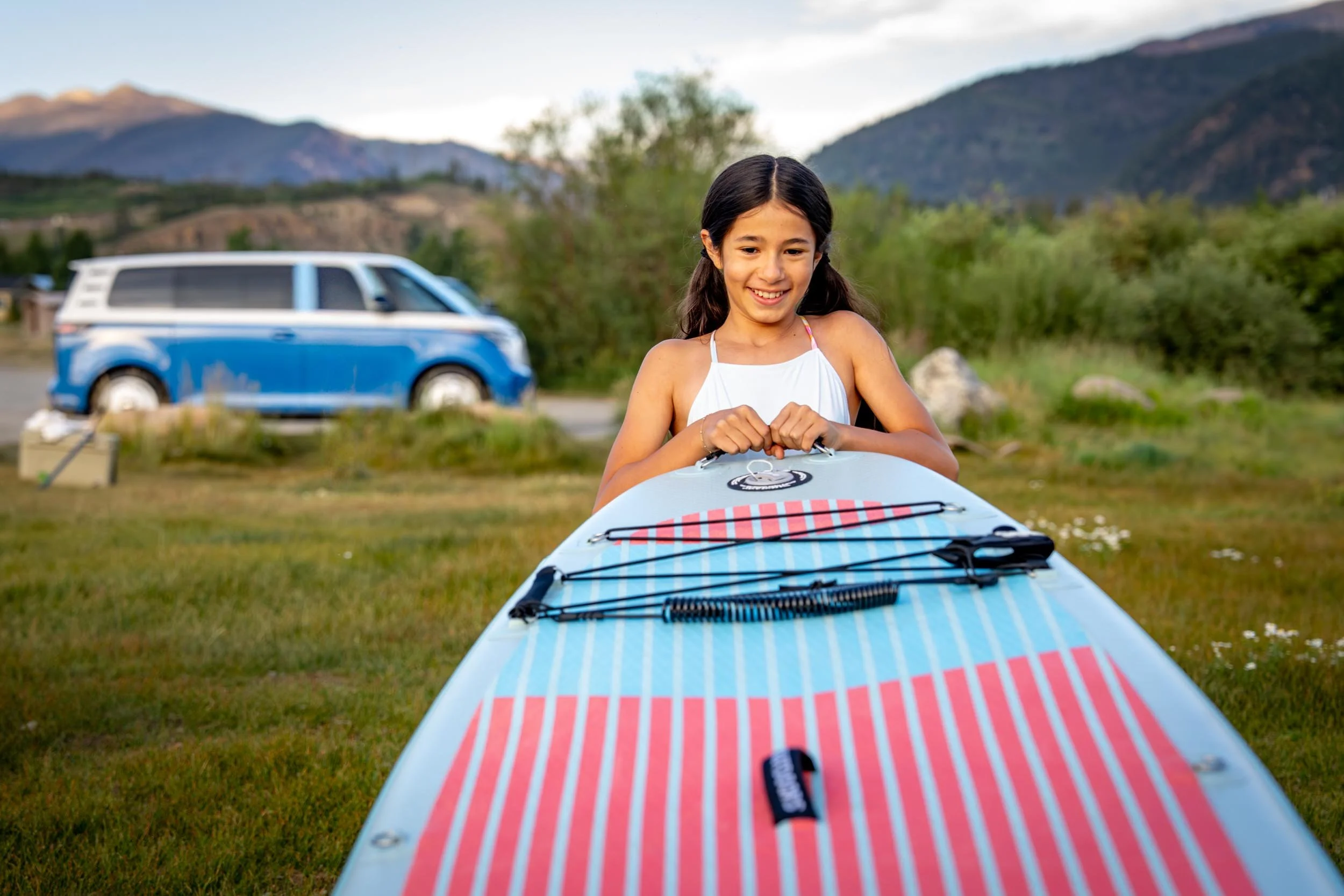Girl-Carrying-Paddleboard.jpg