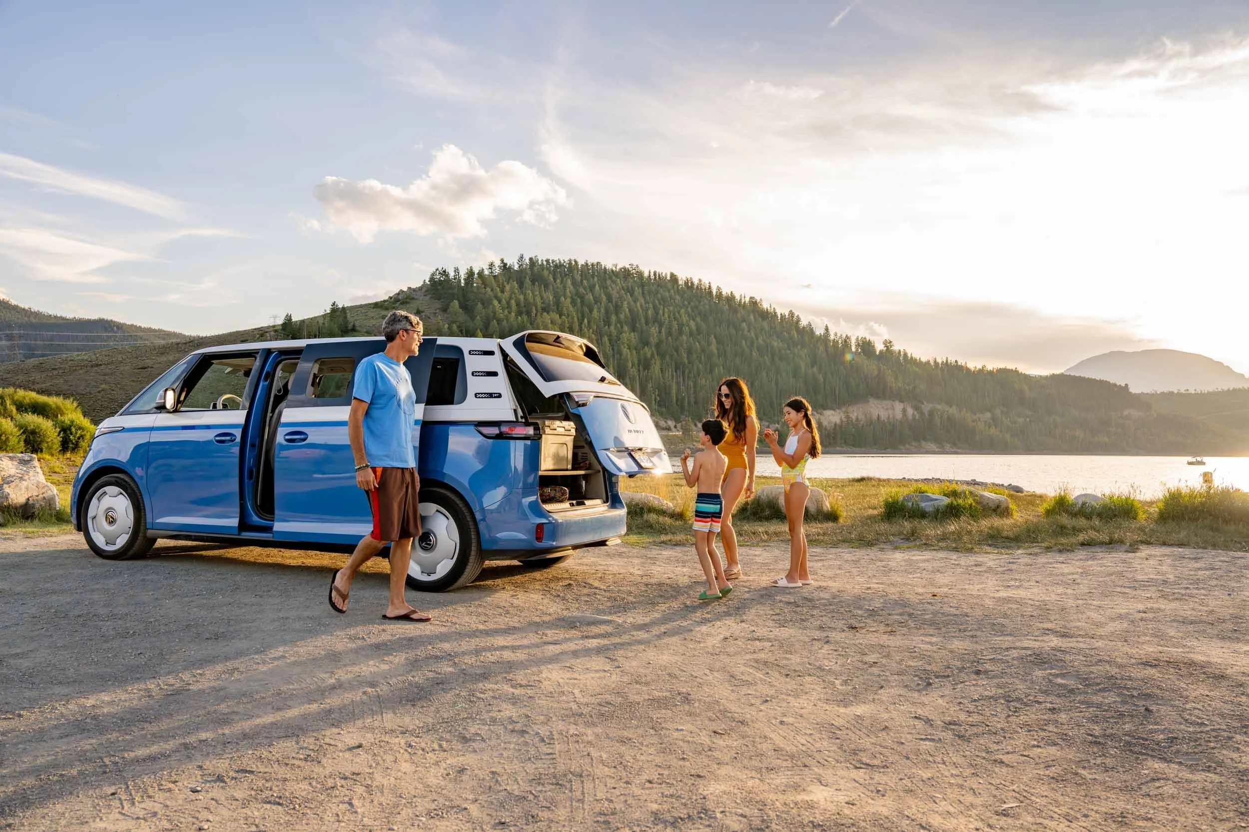 Family-Unloading-Volkswagen-ID-Buzz-by-Lake.jpg