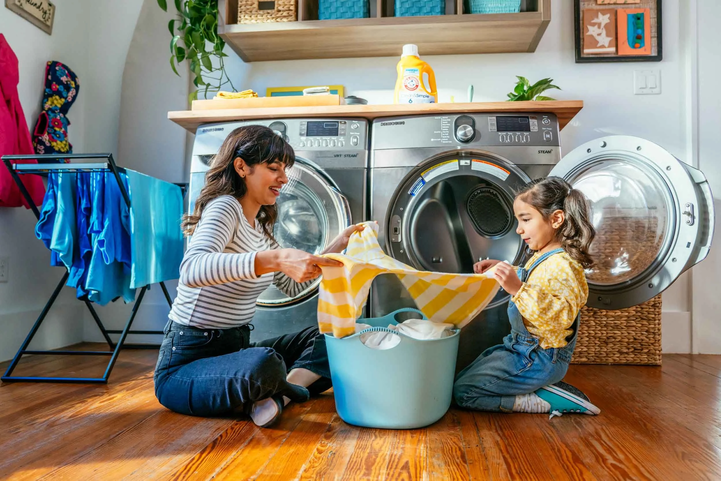 Mom-daughter-folding-laundry-together.jpg