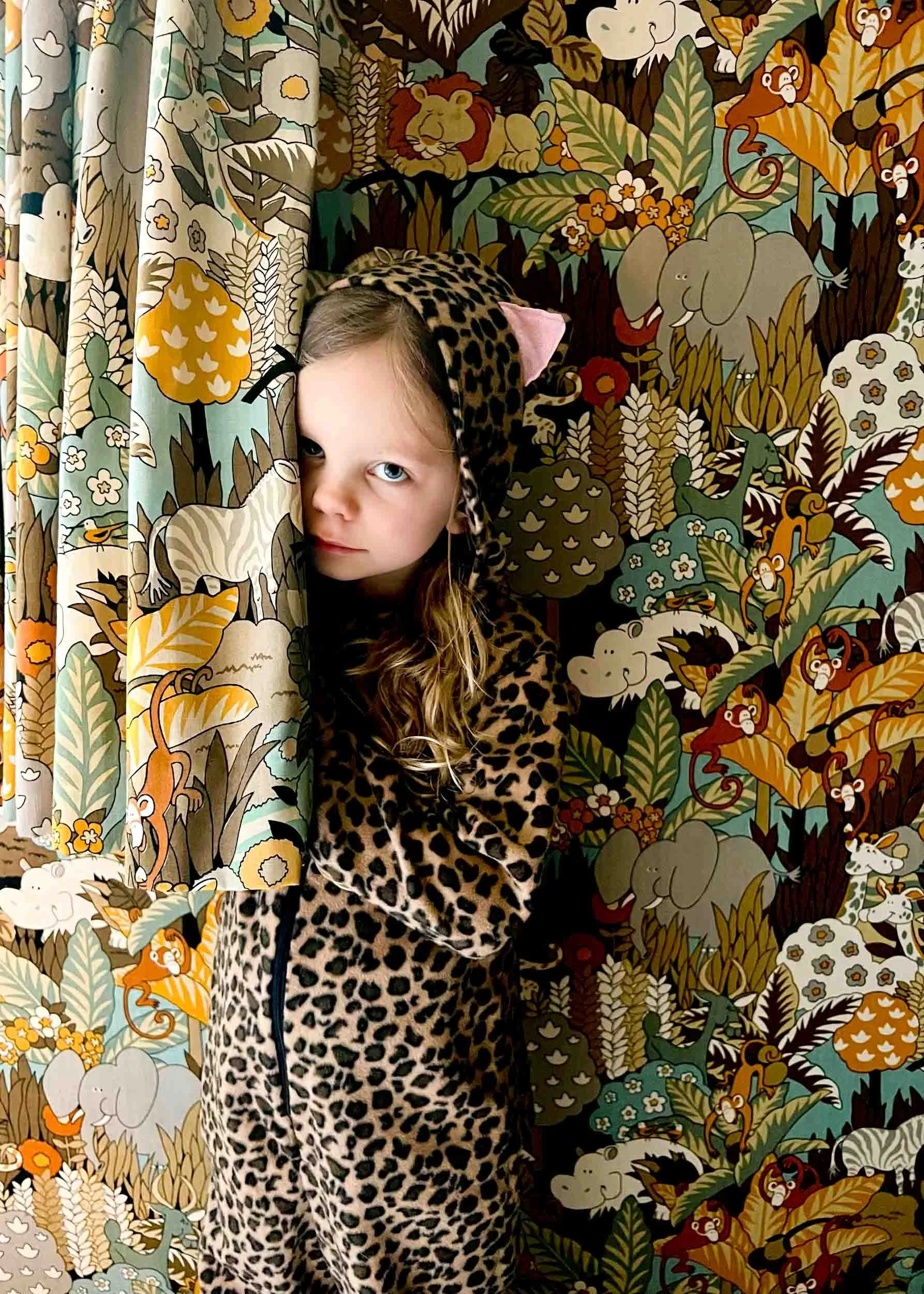Girl-in-Leopard-Outfit-in-Jungle-Themed-Room.jpg