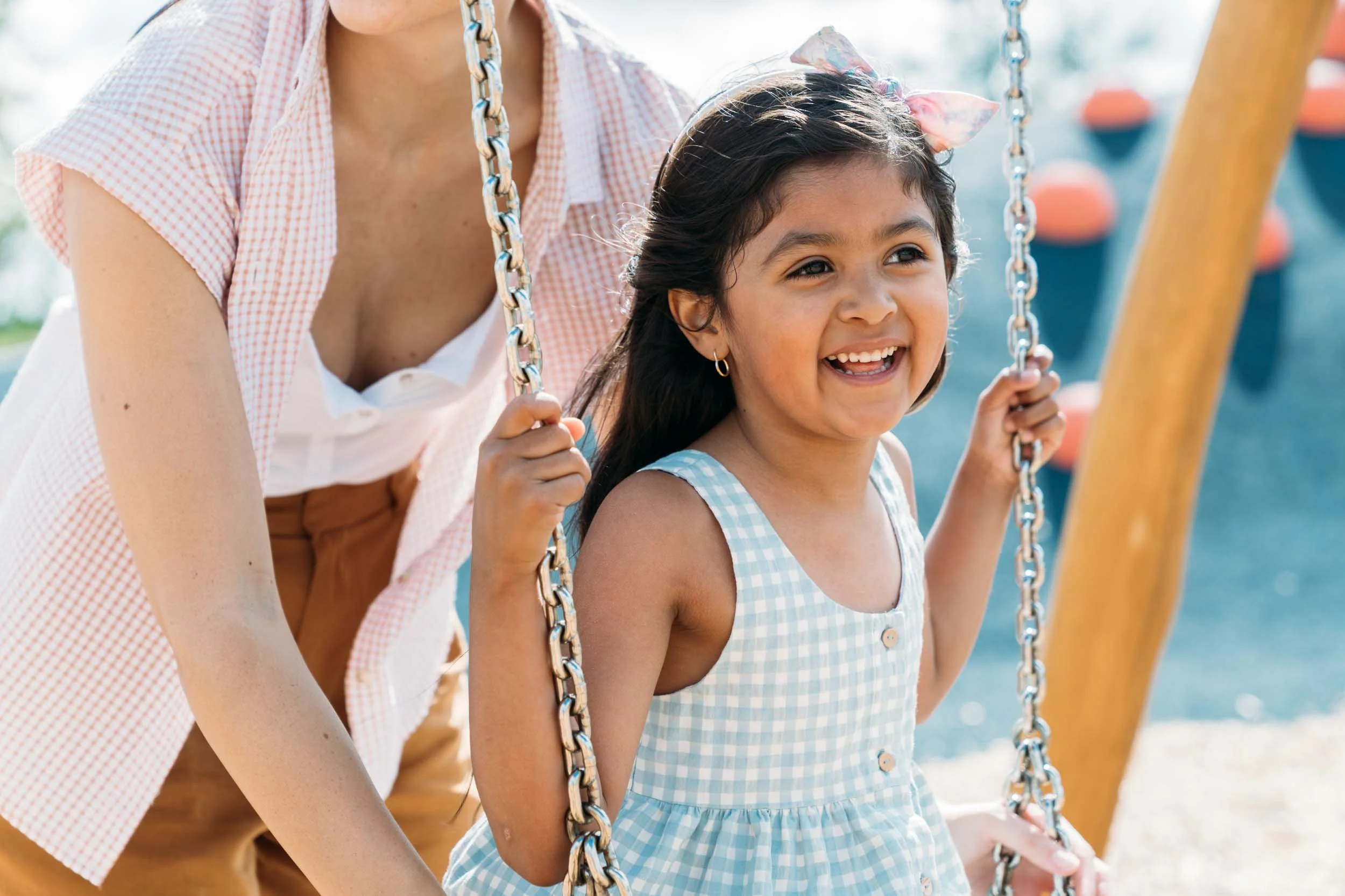 Mom-Pushing-Girl-on-Swing.jpg