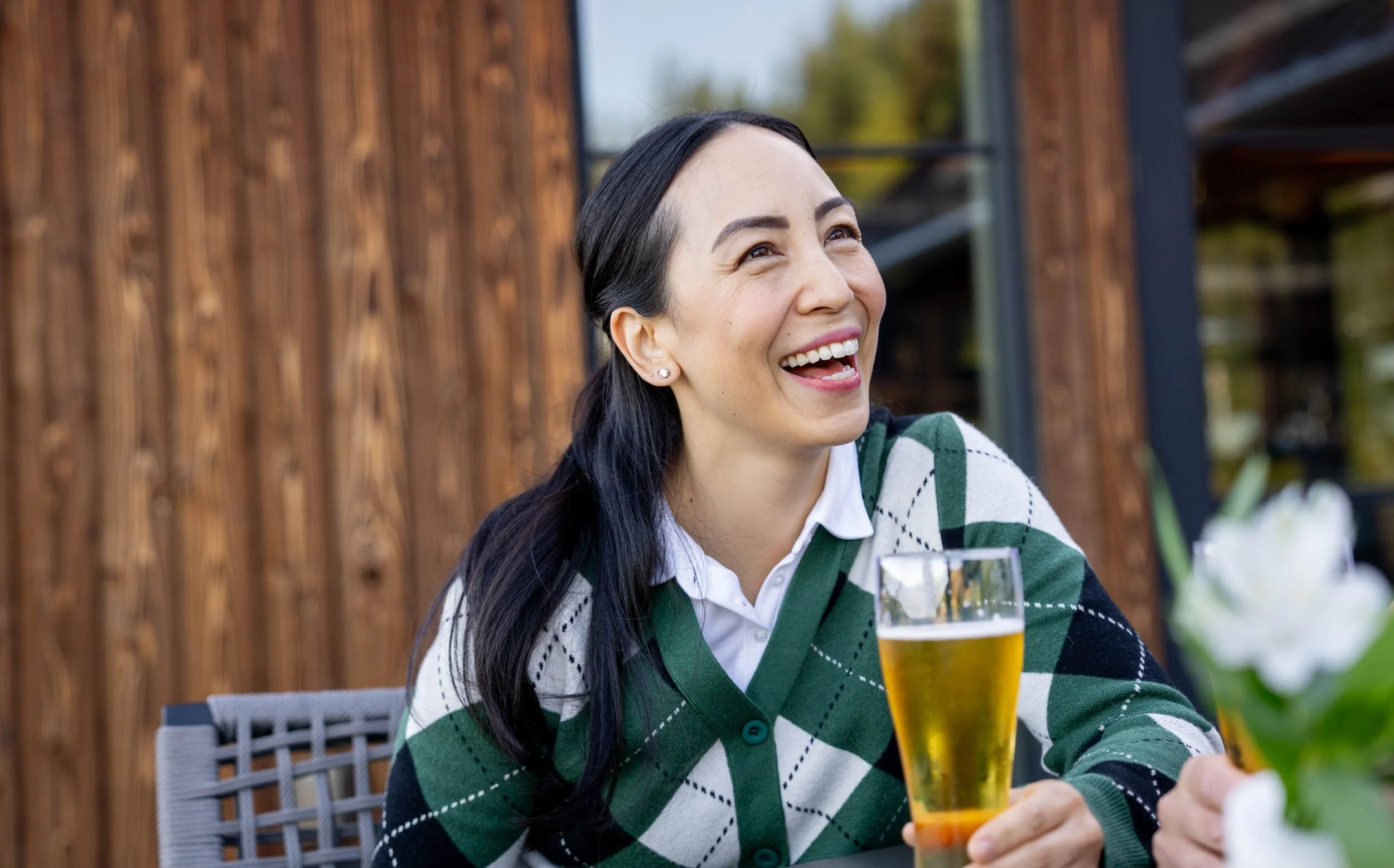 Woman-Enjoying-Beer-Outdoors.jpg