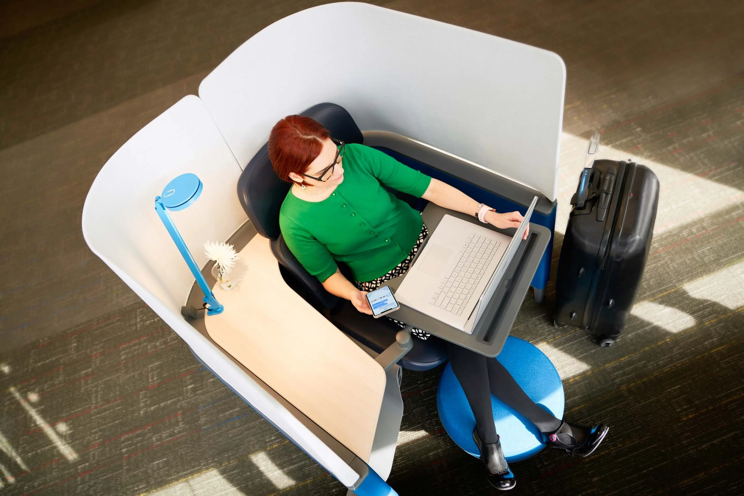 Woman-Working-in-Privacy-Pod-at-Airport.jpg