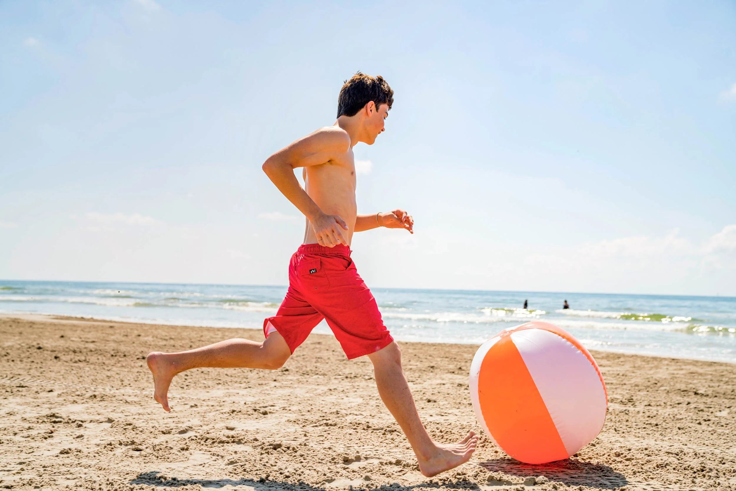 Boy-Kicking-Beach-Ball.jpg