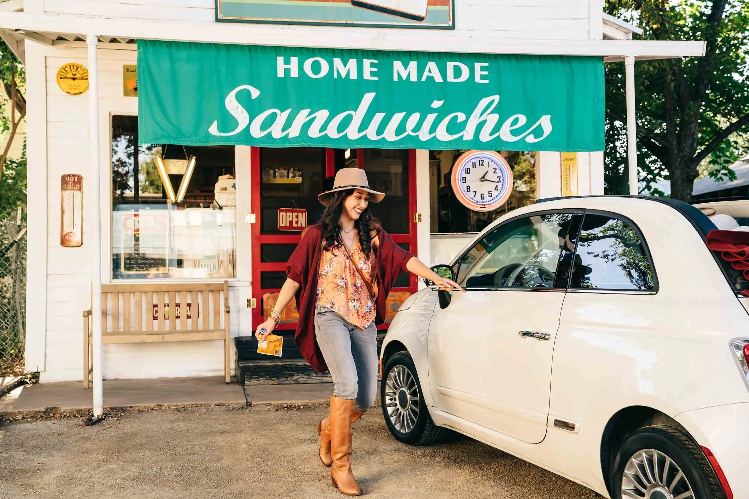 Woman-Leaving-Sandwich-Shop-Getting-into-Car.jpg