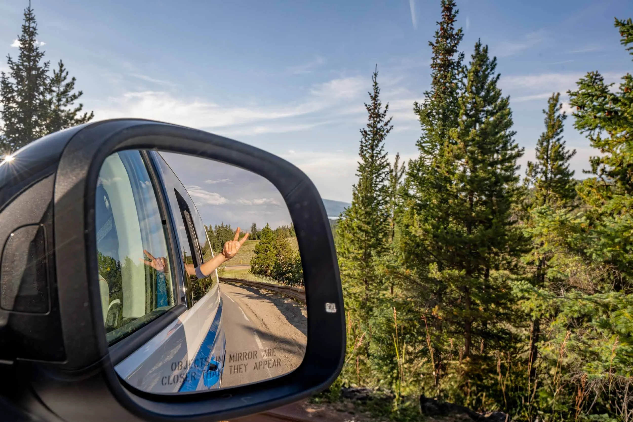 Peace-Sign-in-Car-Mirror.jpg