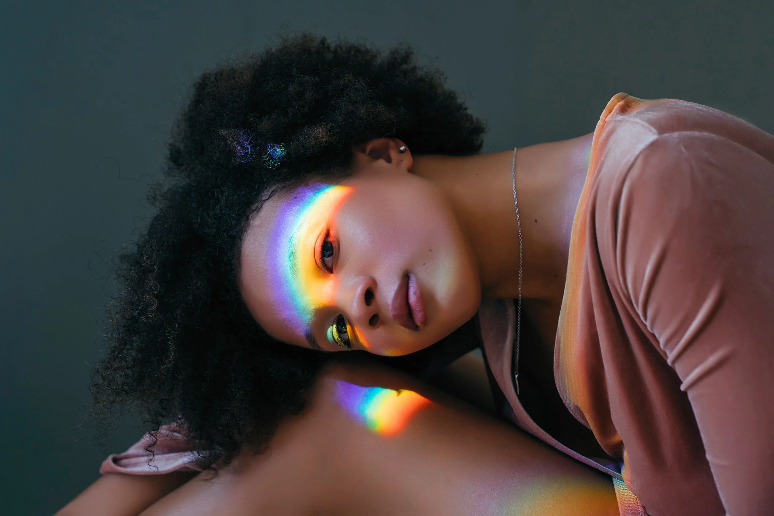 Woman-with-Rainbow-Light-on-Face.jpg