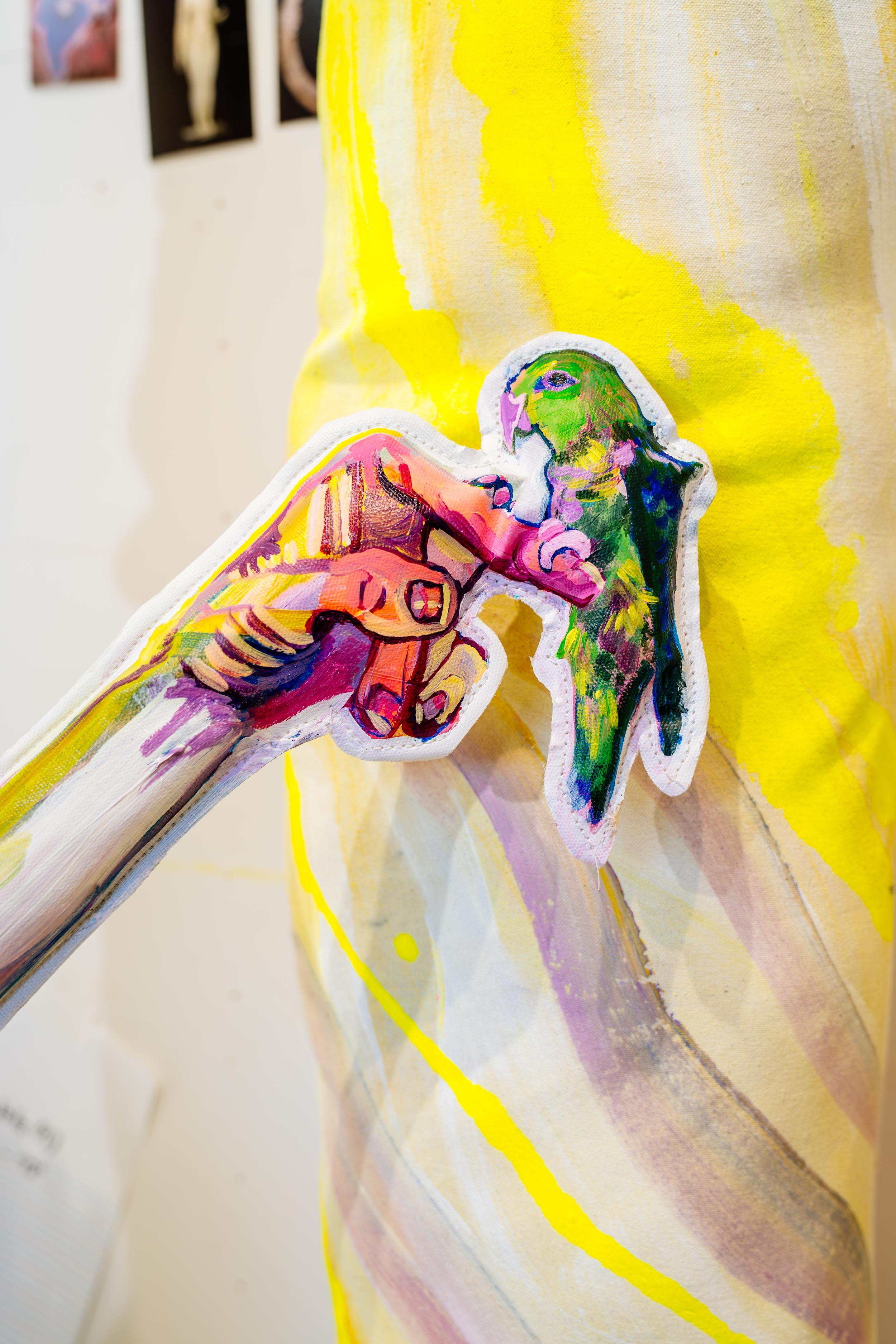 Painting-of-Hand-Holding-Parrot.jpg