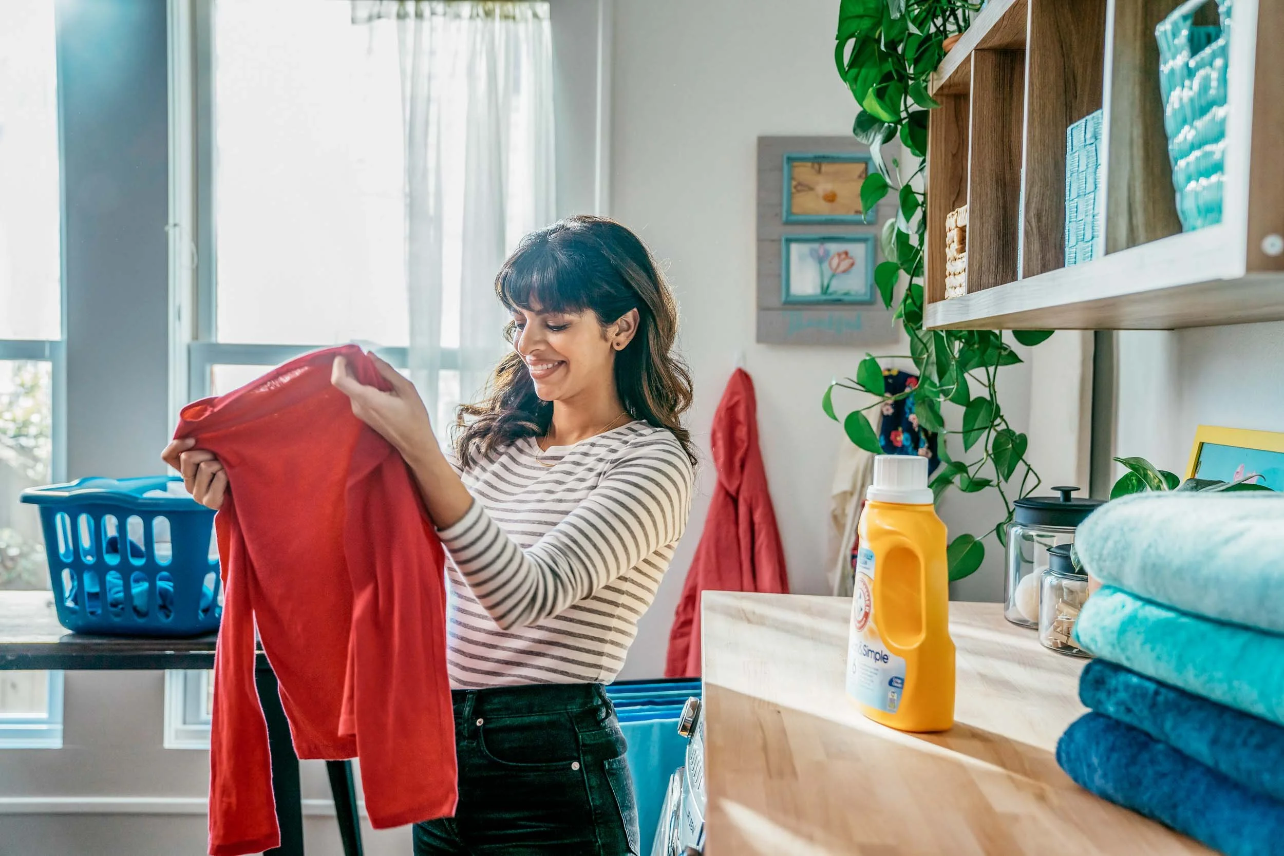 Woman-Folding-Laundry.jpg