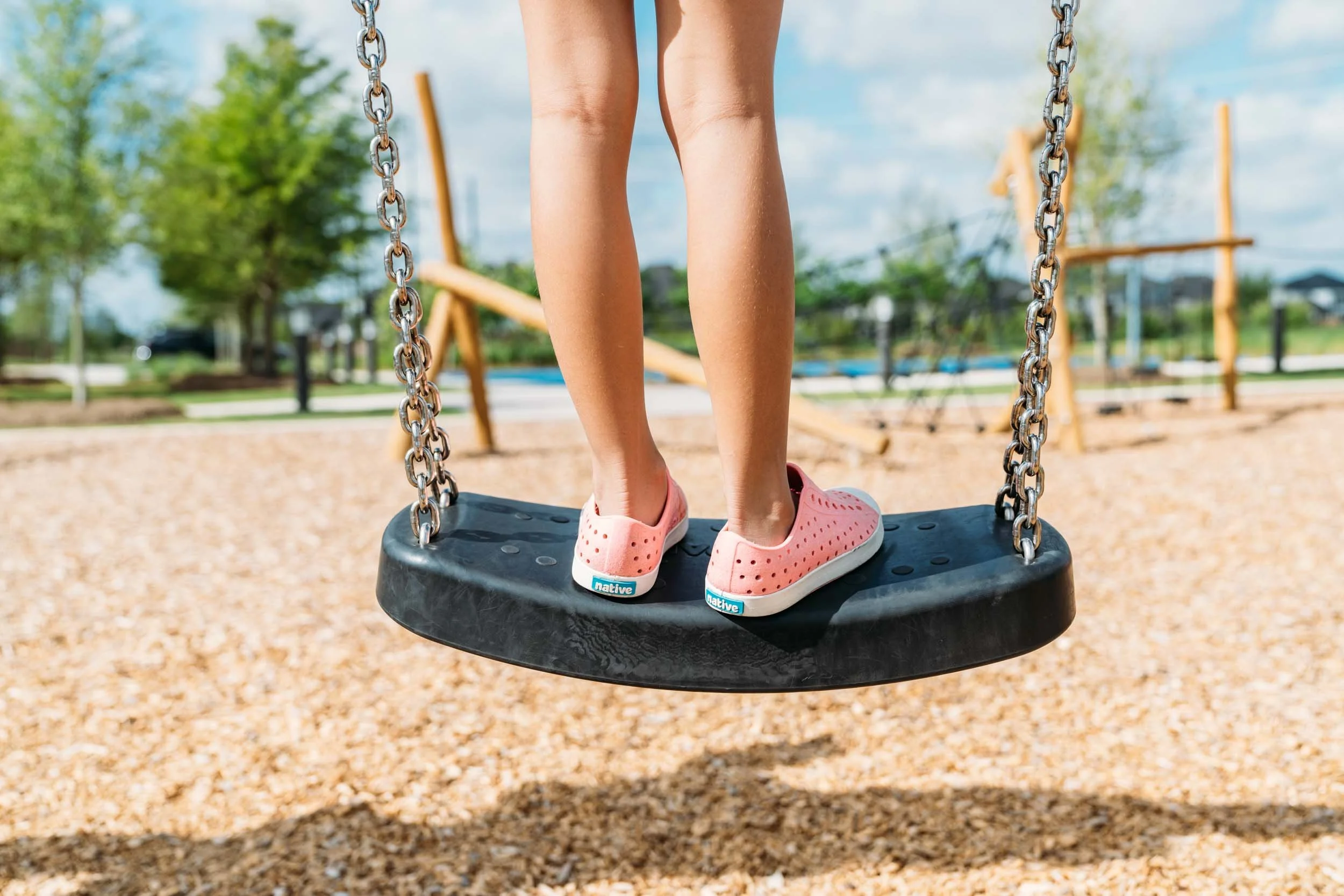 Child-Standing-on-Swing.jpg