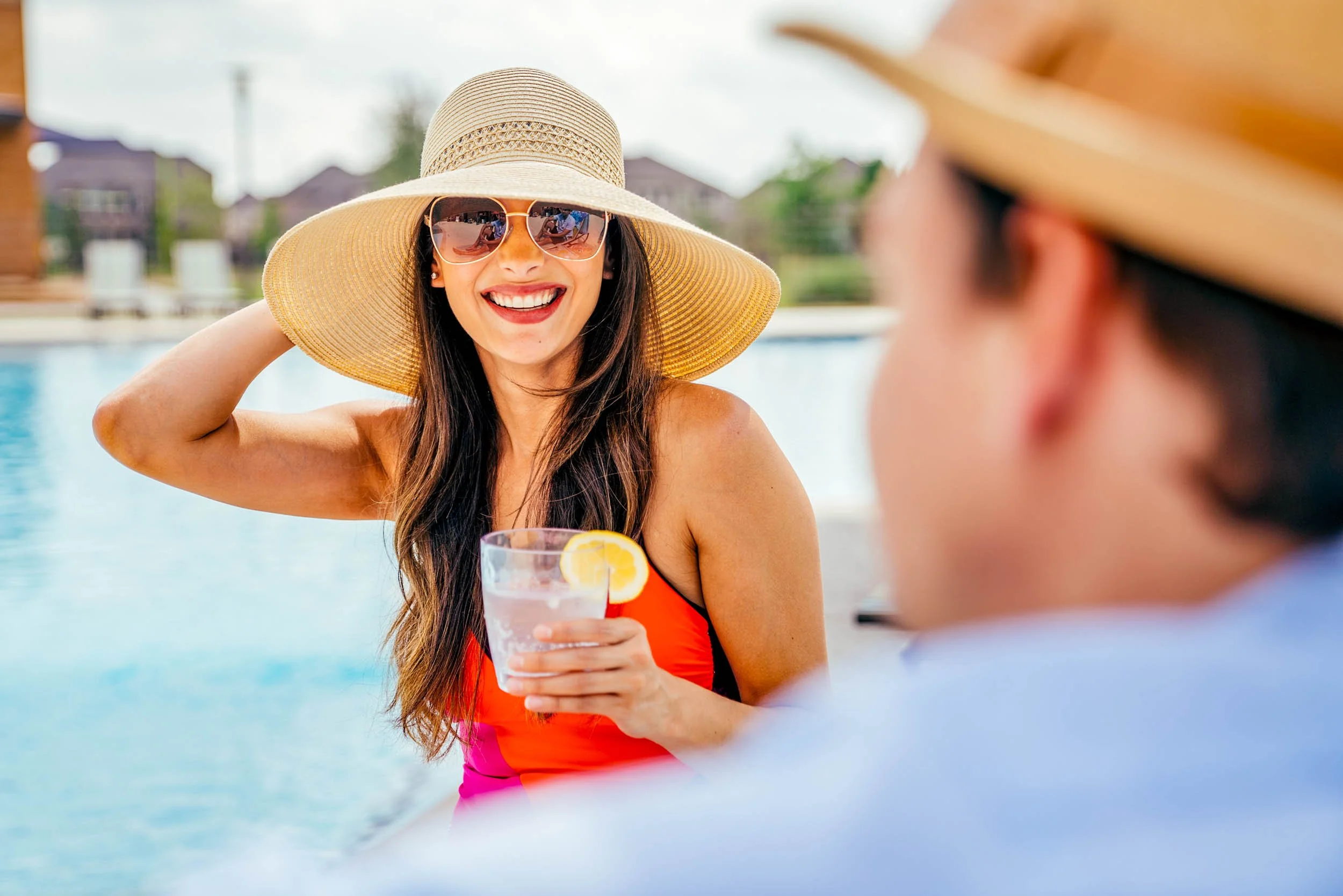 Woman-with-cocktail-by-pool.jpg