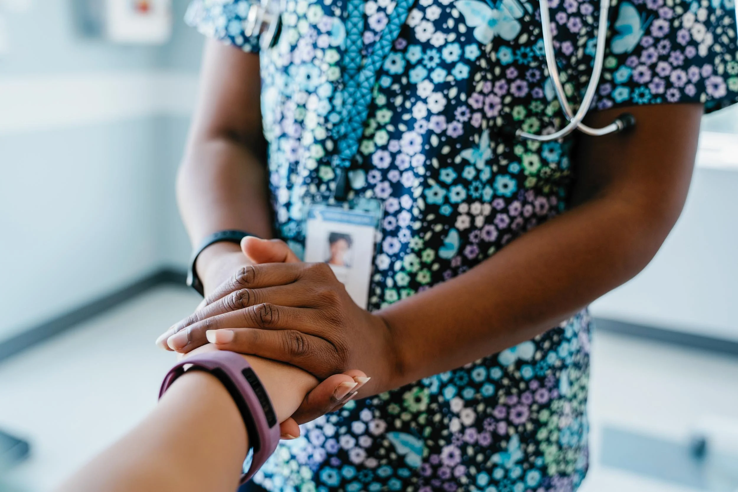 Nurse-Holding-Patient-Hand.jpg