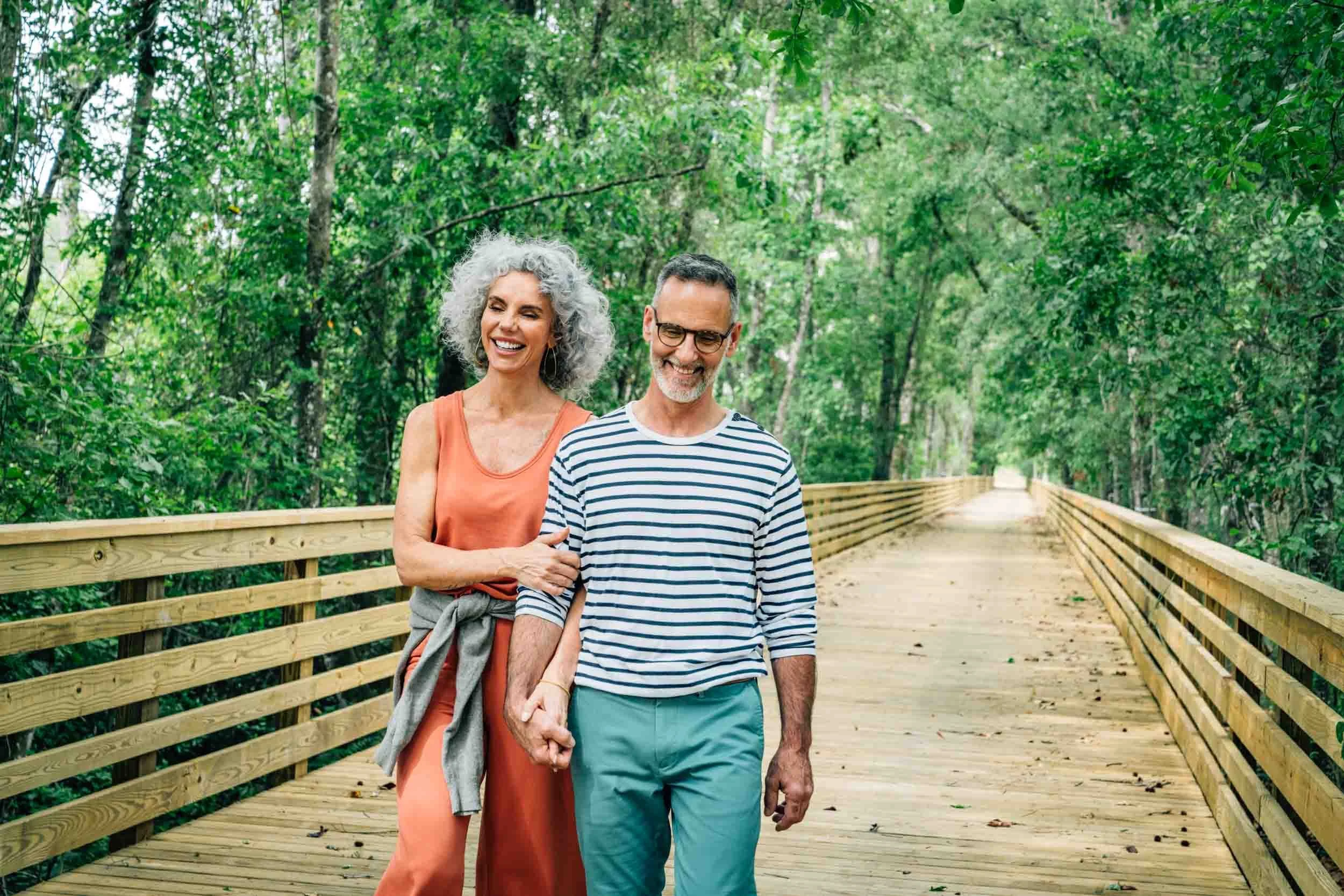 Mature-Couple-Walking-in-Forest.jpg