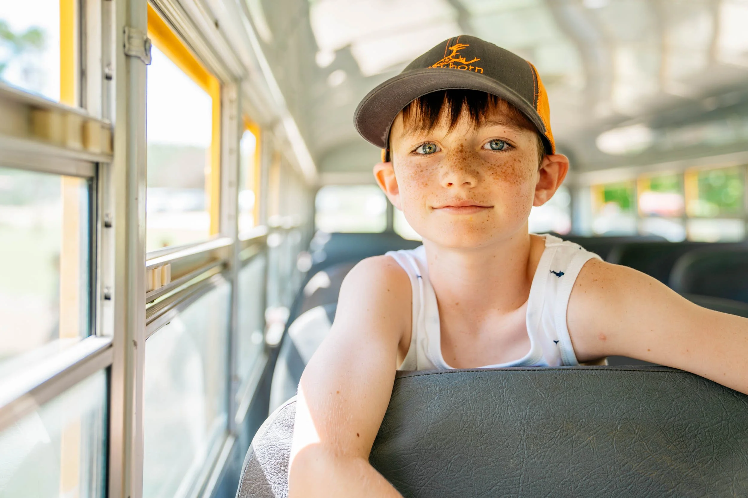 Boy-on-School-Bus.jpg