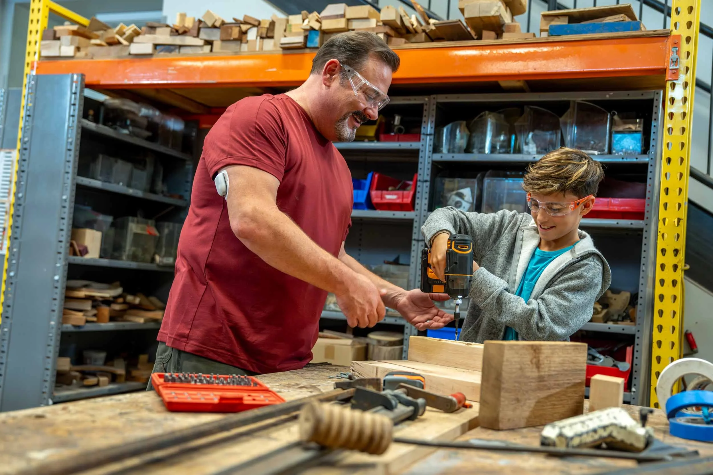 Man-Working-with-Kid-in-Wood-Shop.jpg