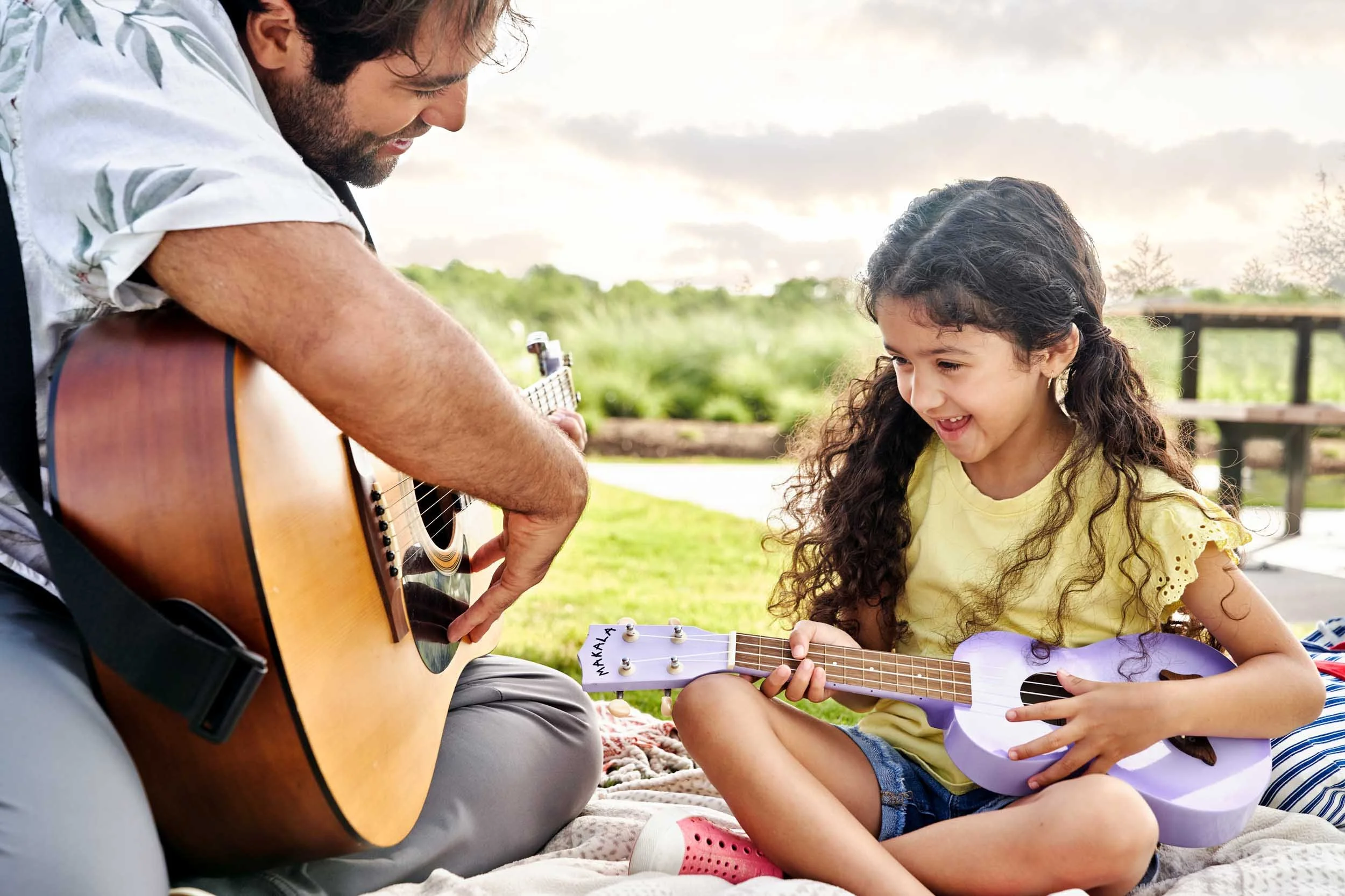Guitar-and-Ukulele-Lesson-Outdoors.jpg