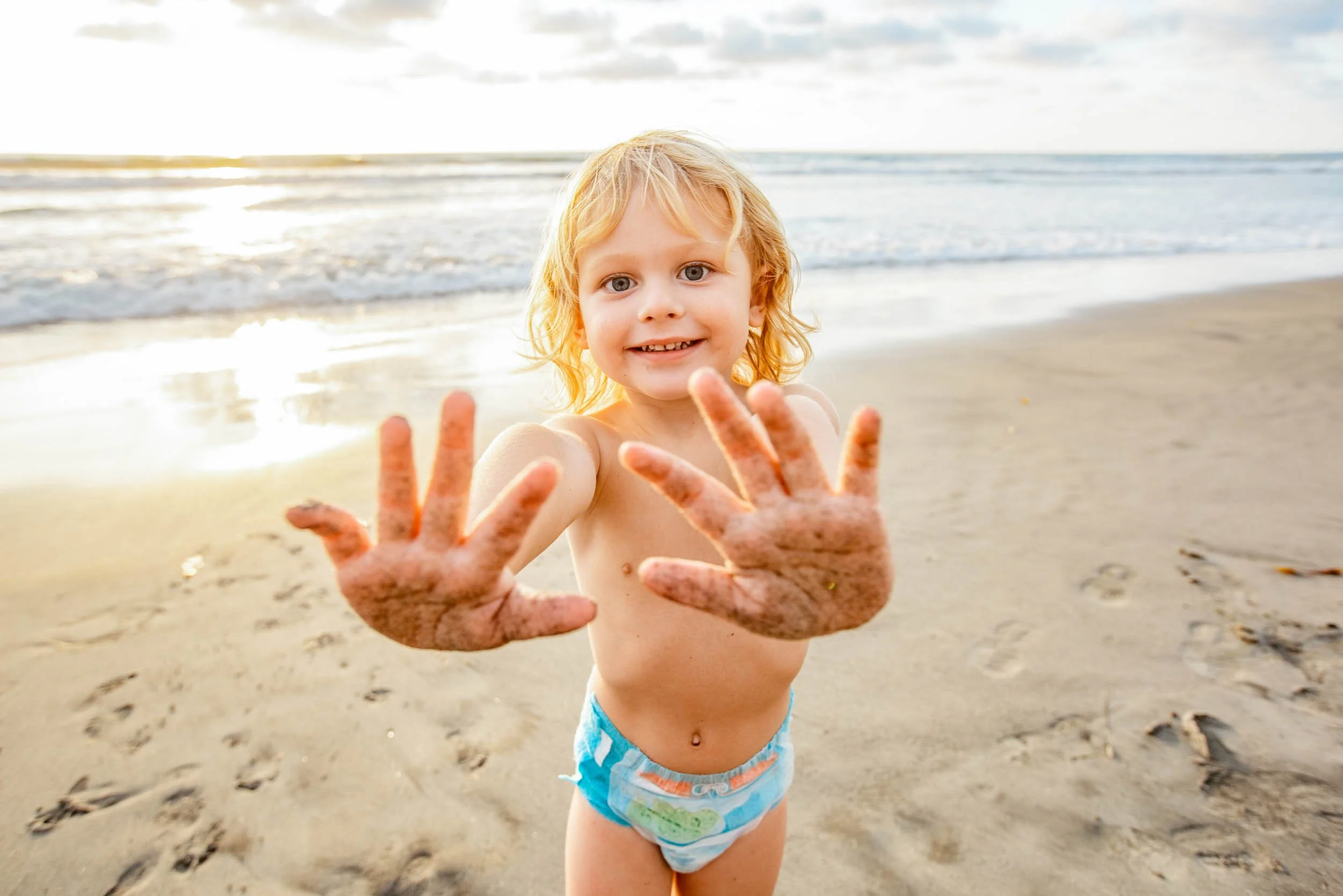 Child-Playing-in-Sand-at-Beach.jpg