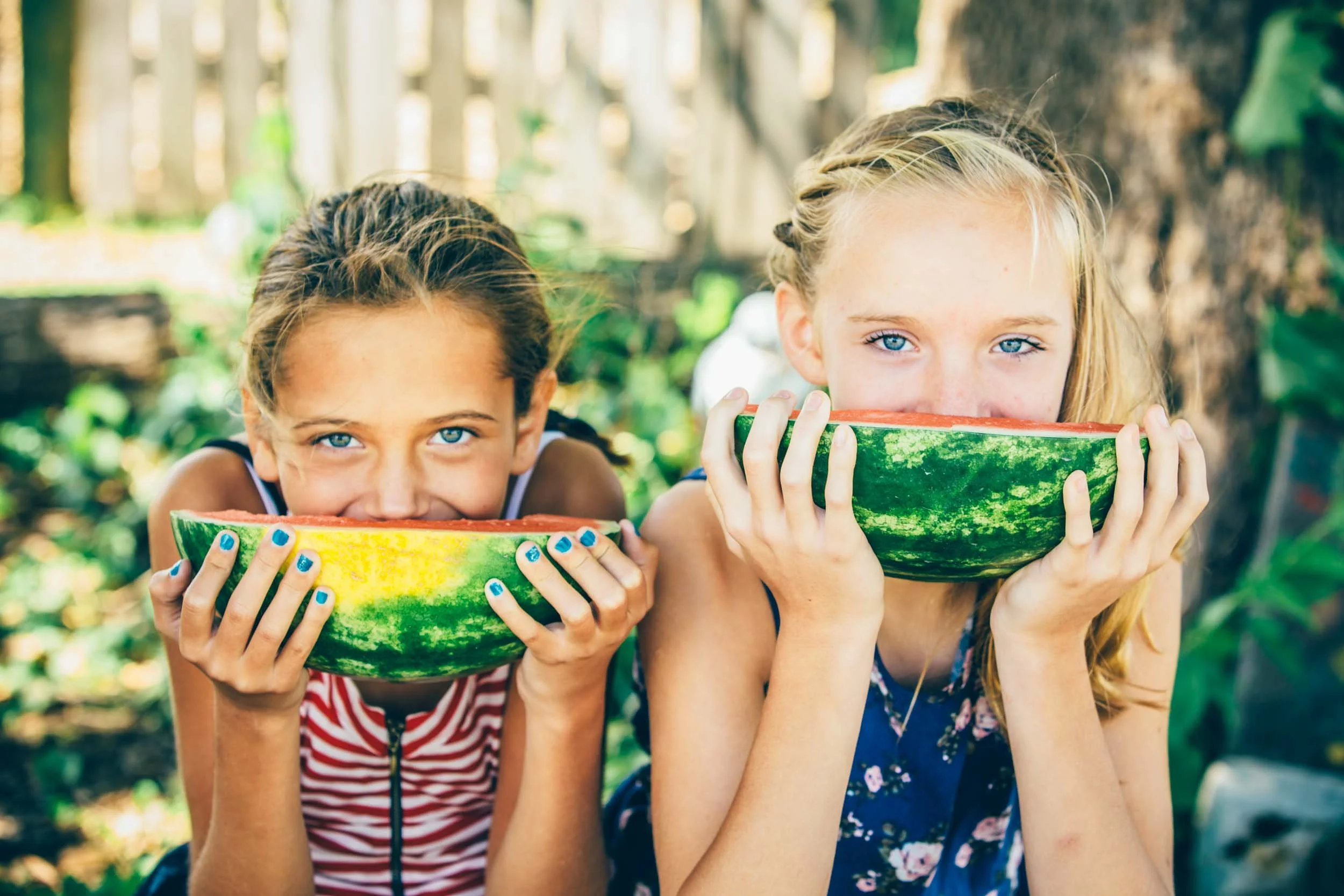Girls-Enjoying-Watermelon.jpg