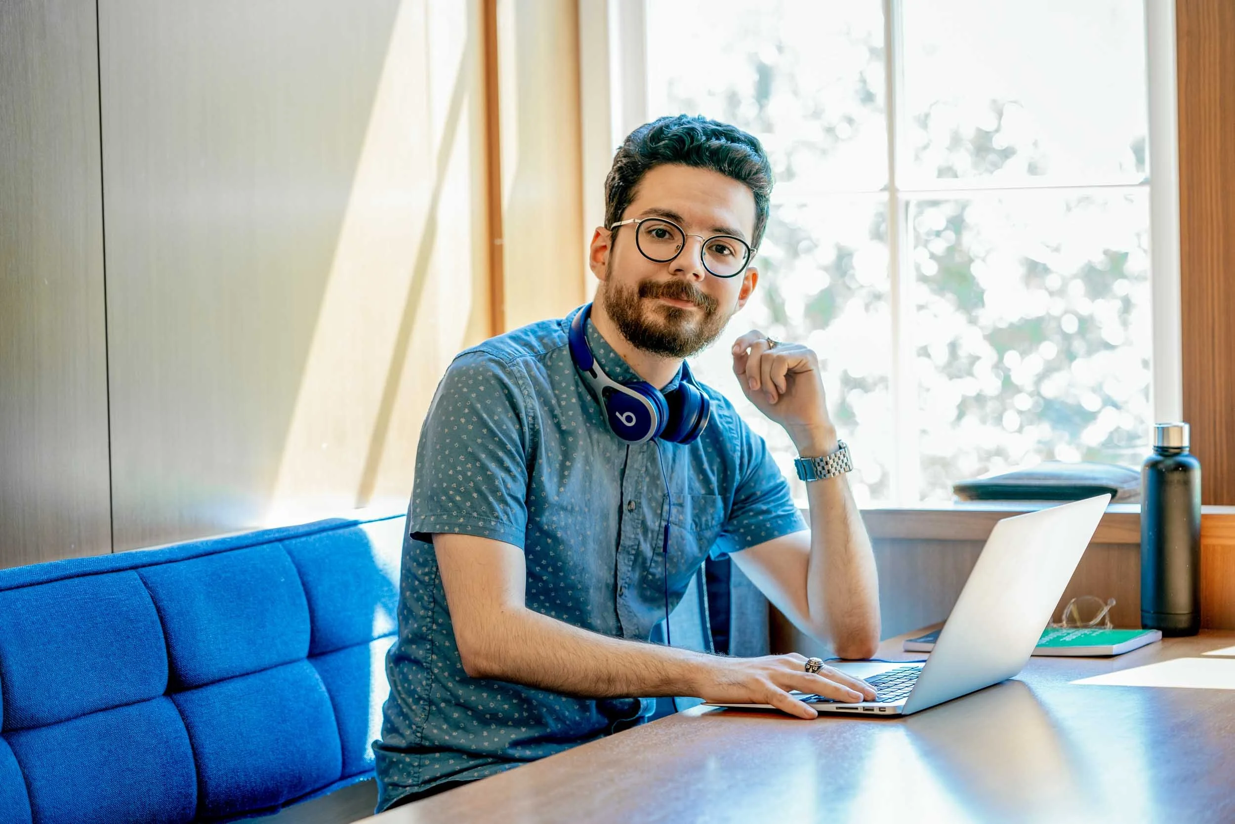 Portrait-of-male-college-student-with-laptop.jpg