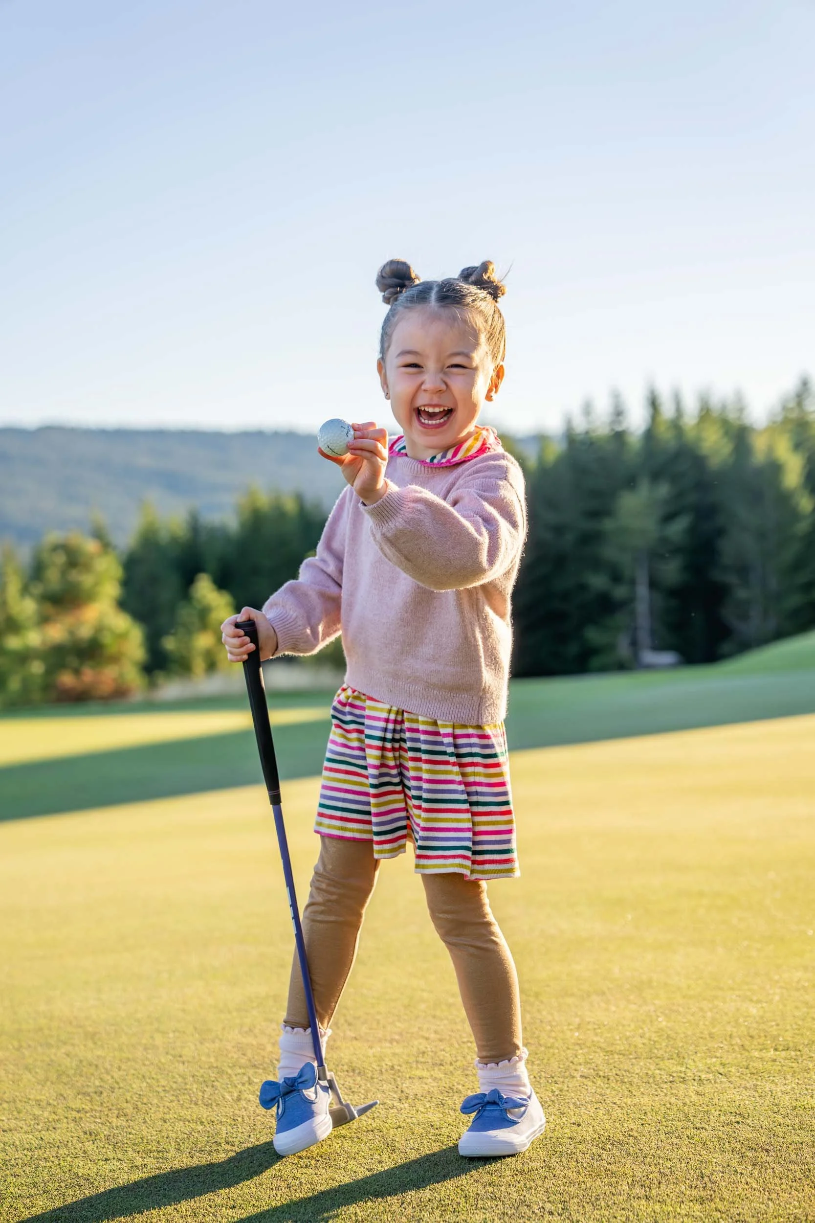Smiling-Girl-on-Golf-Course.jpg