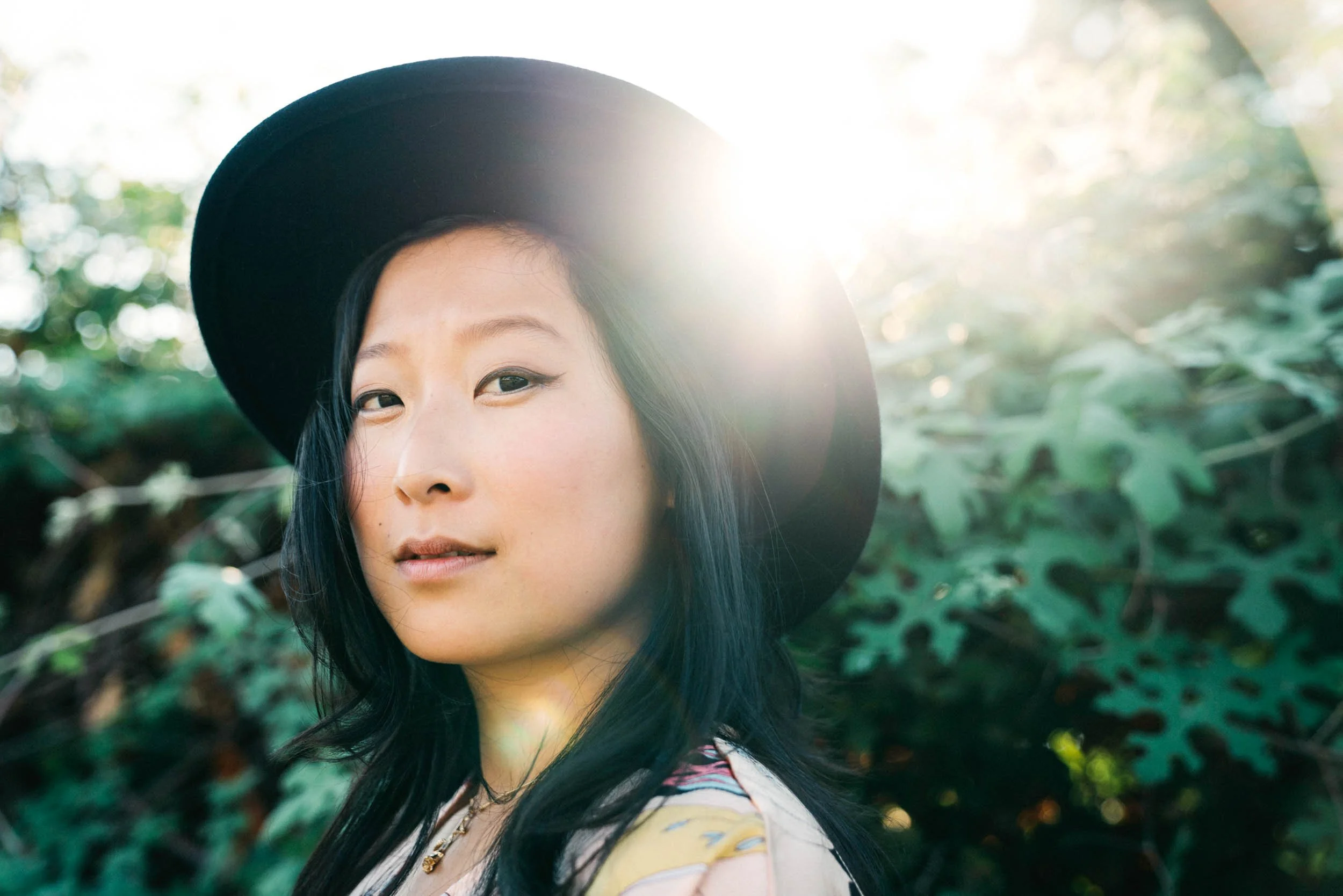 Woman-Wearing-Black-Hat-in-Sunlight .jpg