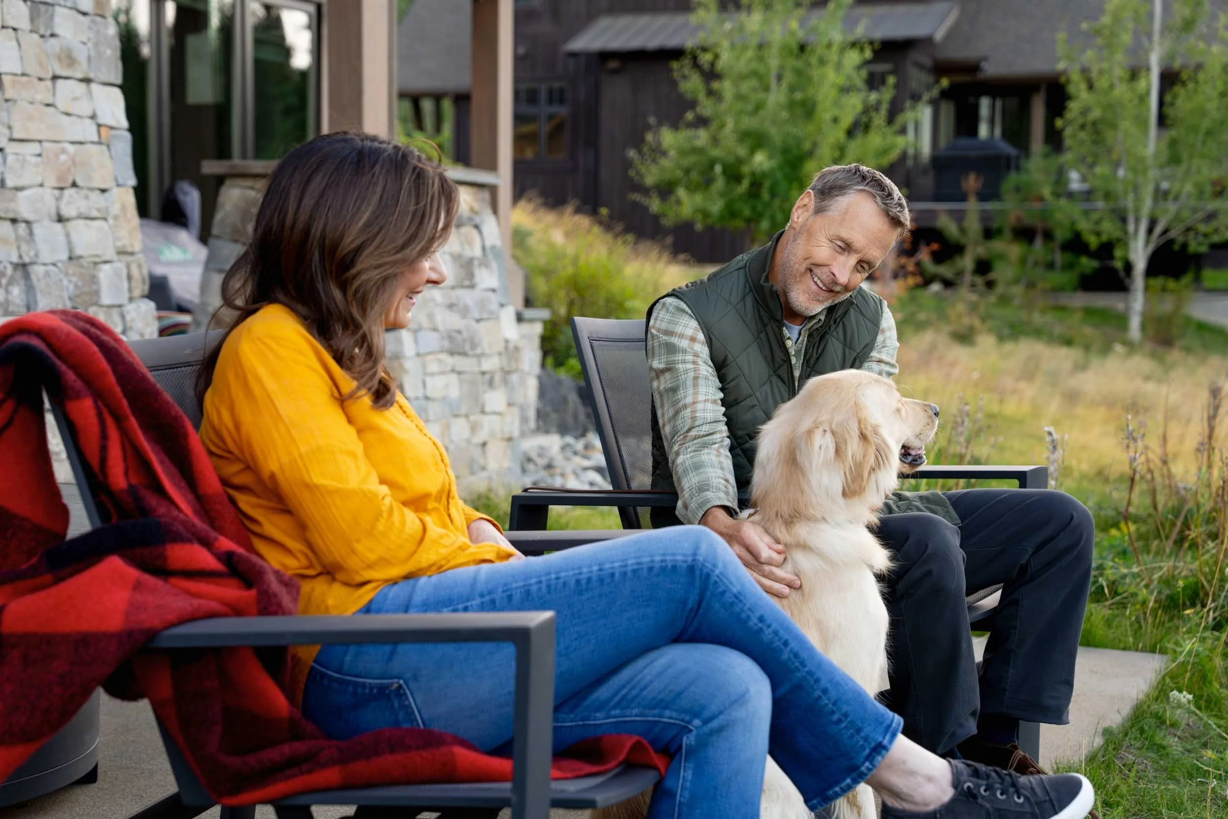 Couple-Relaxing-Outside-with-Dog.jpg