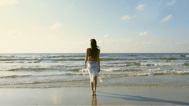 Woman-Walking-Into-Ocean.gif