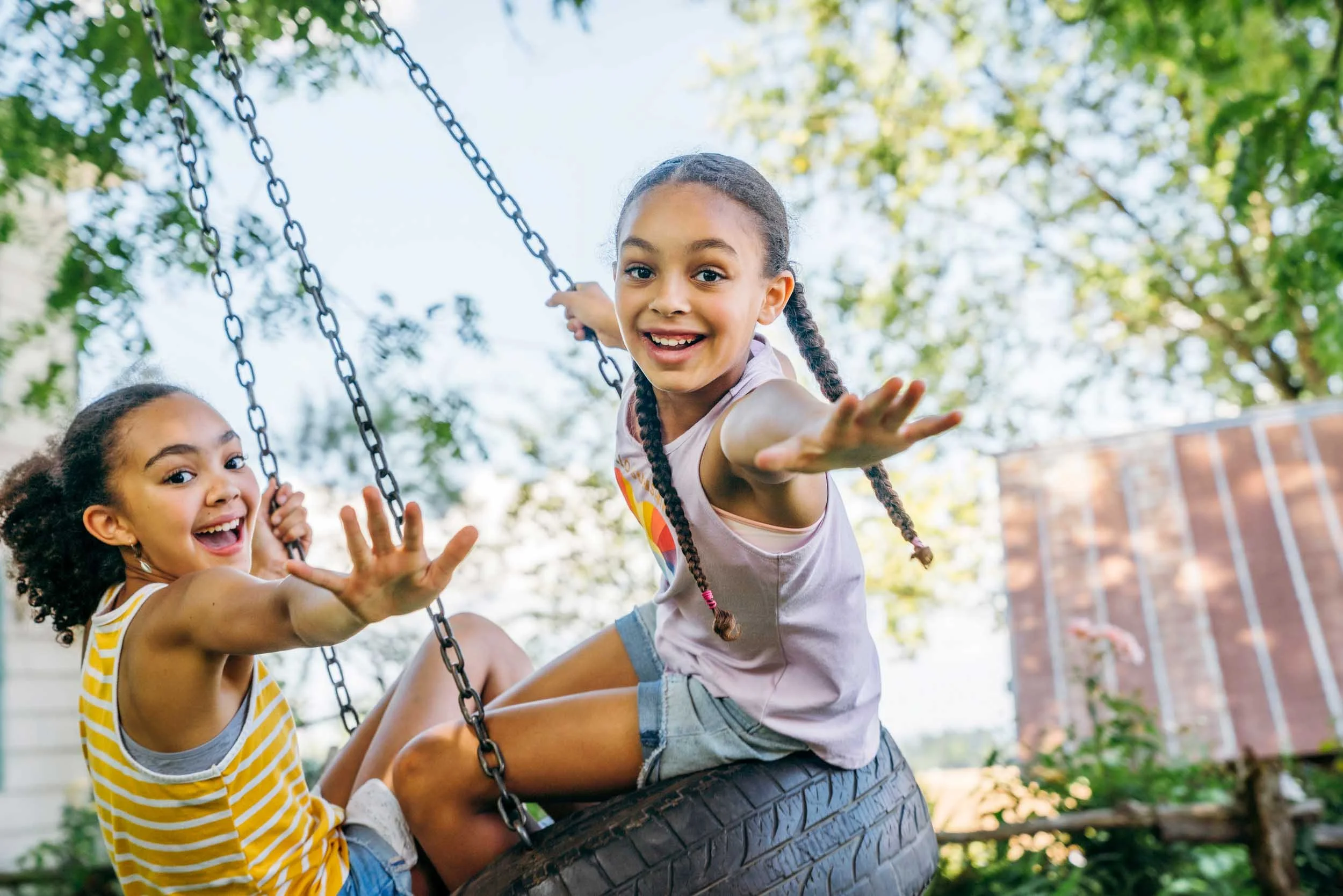 Girls-on-Tire-Swing.jpg