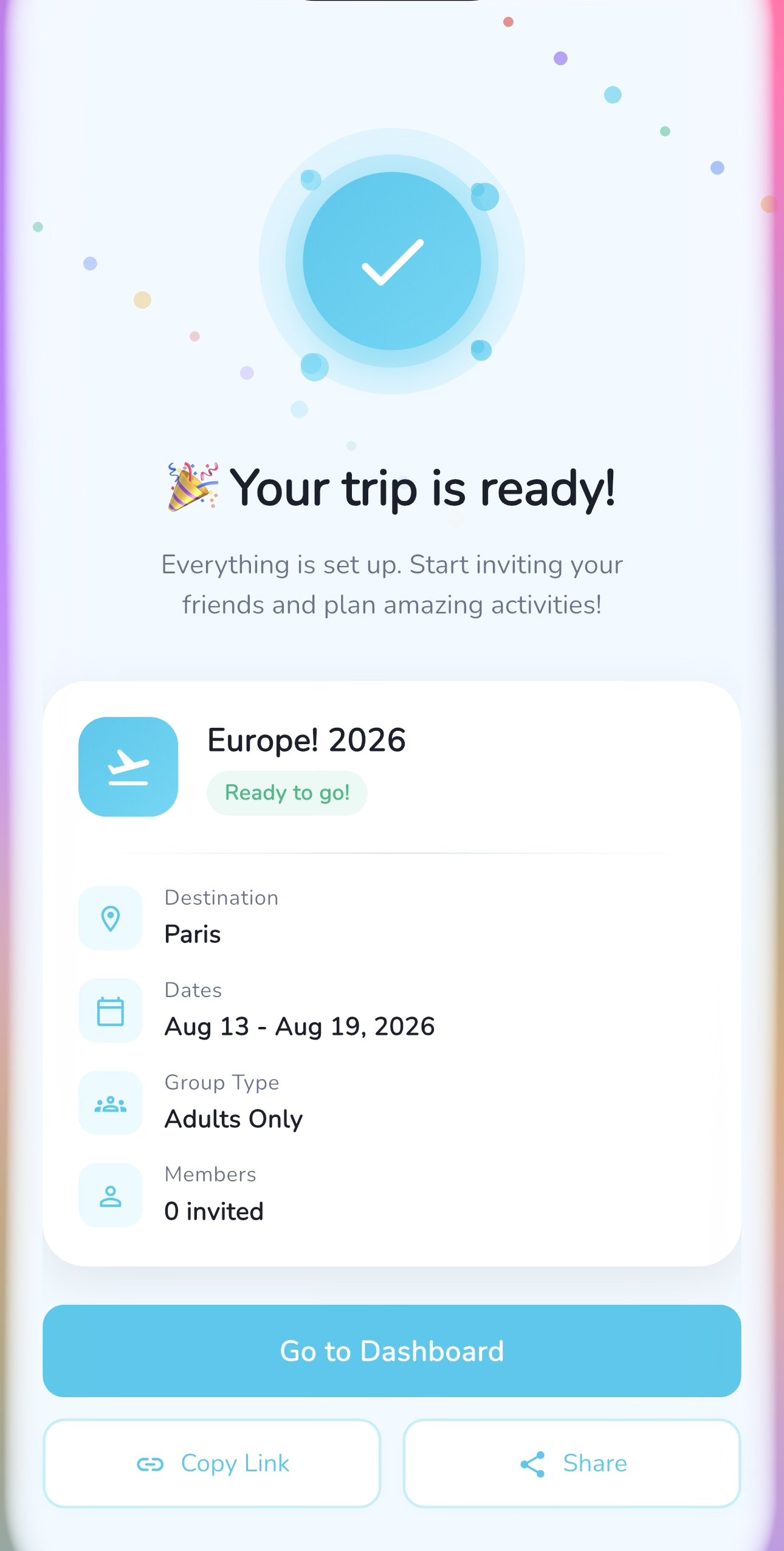 A mobile app screen indicating a trip to Europe in 2026 is ready, with details including destination Paris, dates from August 13 to August 19, 2026, for adults only, and no members invited. The interface has a celebratory design with a blue check mark, colorful confetti, and buttons to go to the dashboard, copy link, or share.