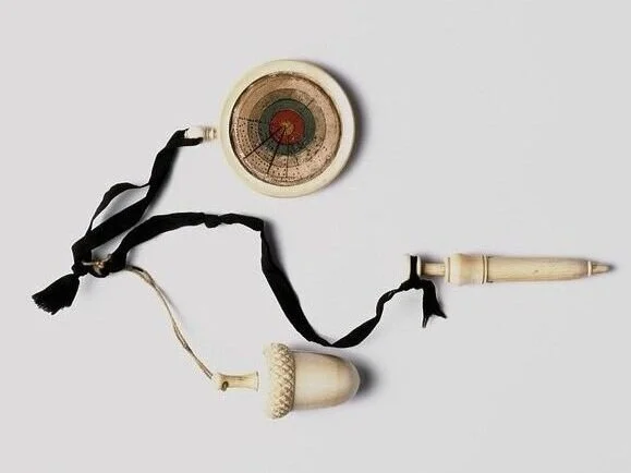 When venturing into London from her home in the countryside, she would bring her archery kit containing seed embedded clay darts rather than arrows. One would imagine that between running errands, she would throw the clay darts and use the scoring ch