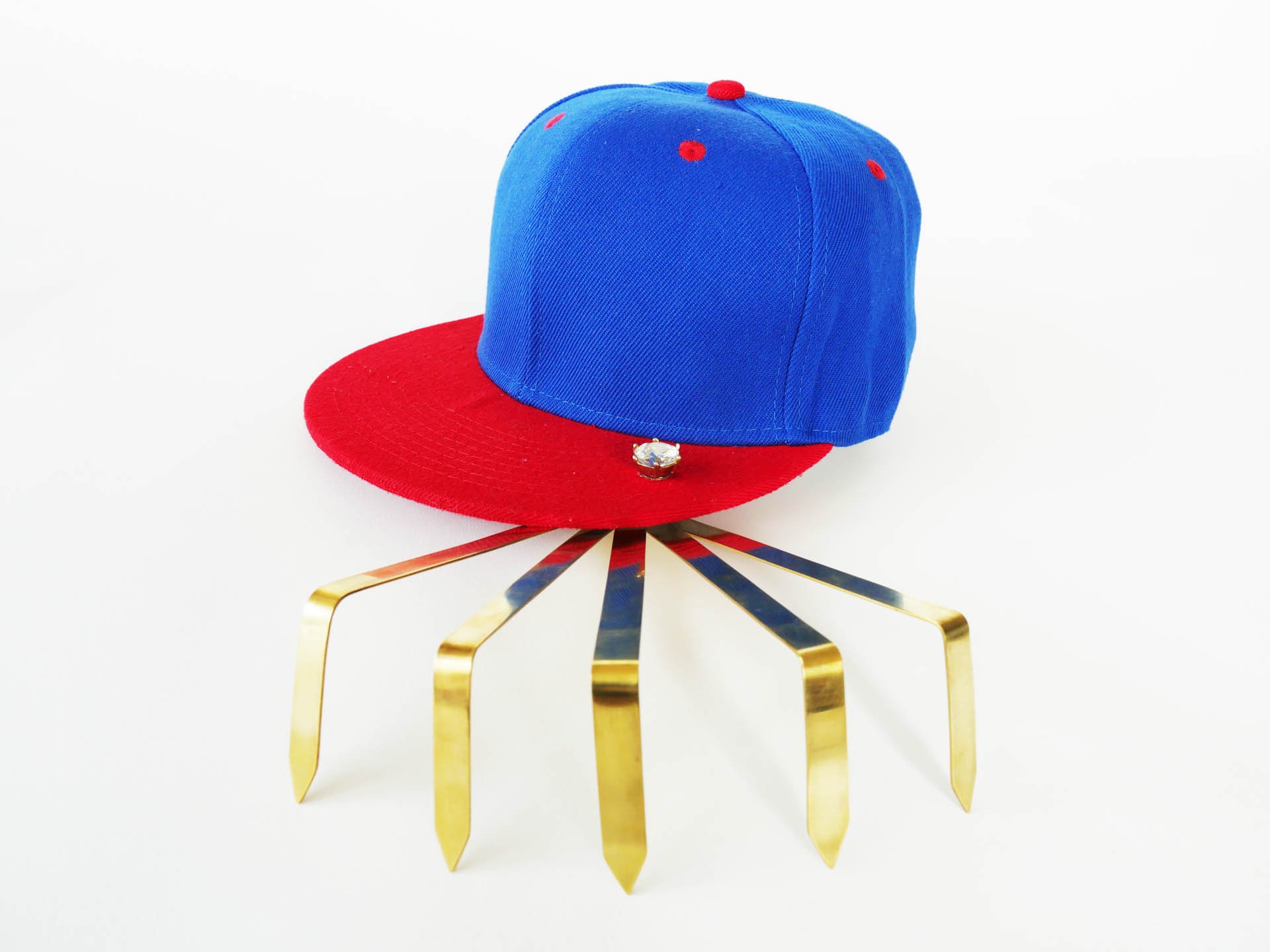 Ball cap with rake attachment.