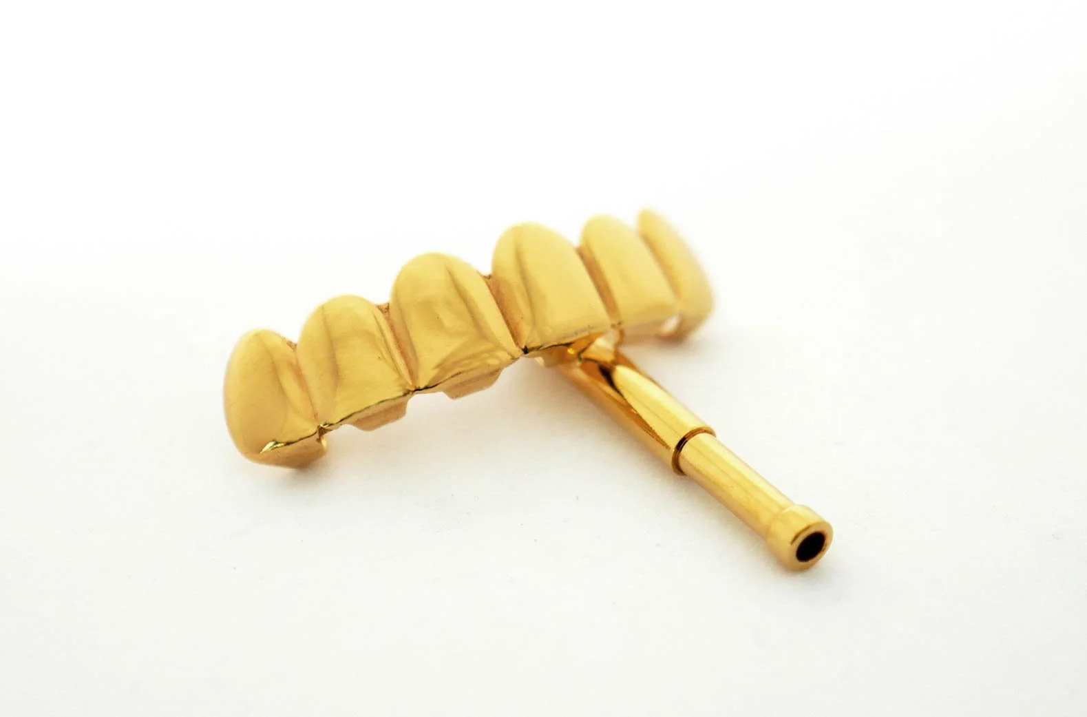 Grill with telescopic seed shooter