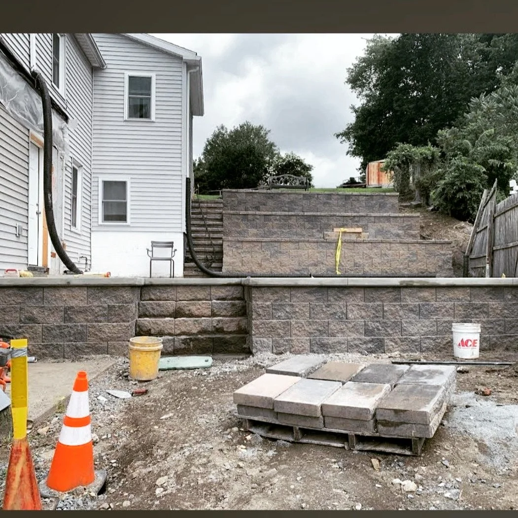multi-level retaining walls with built in steps #versalock #retainingwall ##qualitymasonryNEPA