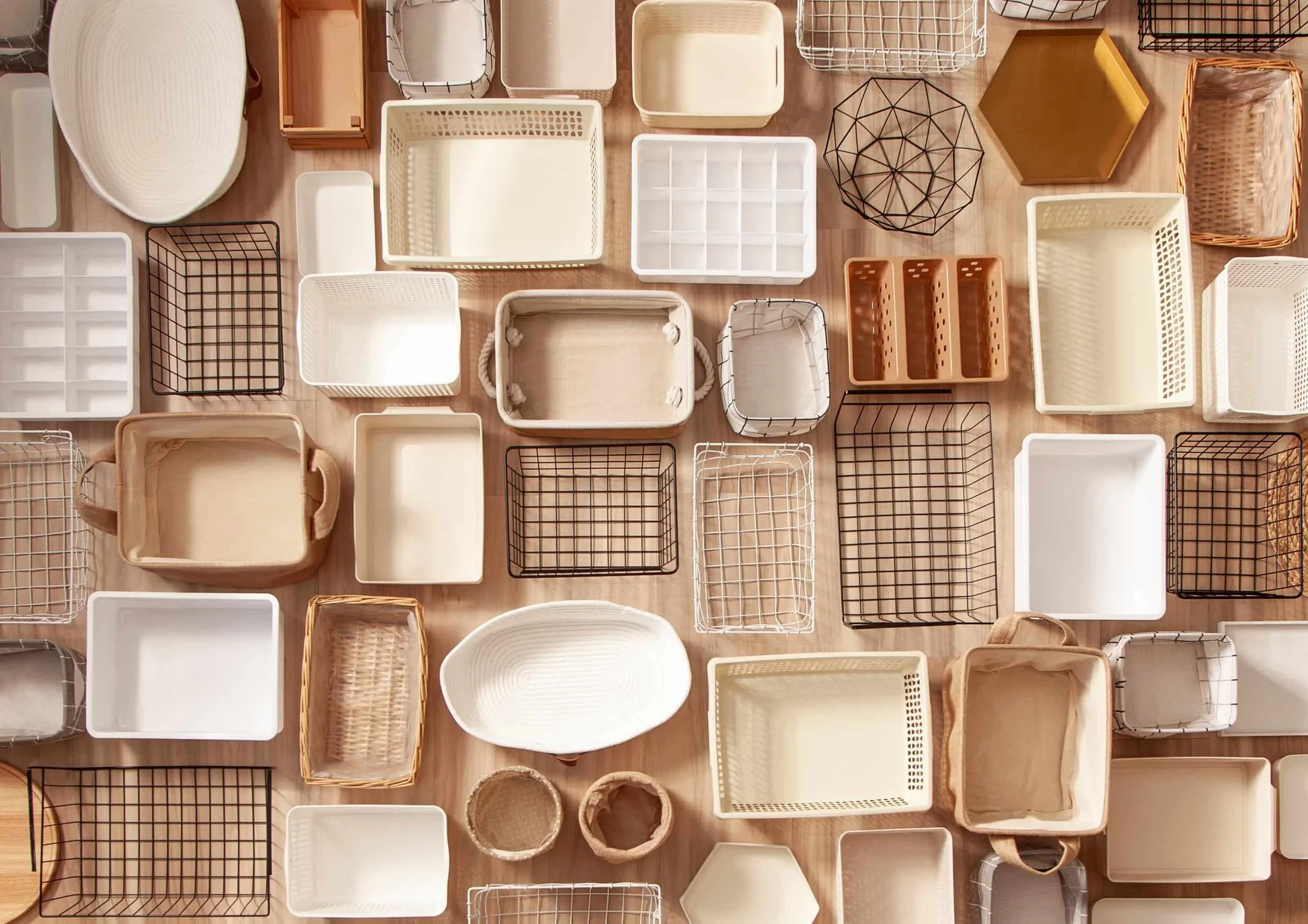 Organizing bins, baskets, and storage containers used to create functional home organizing systems