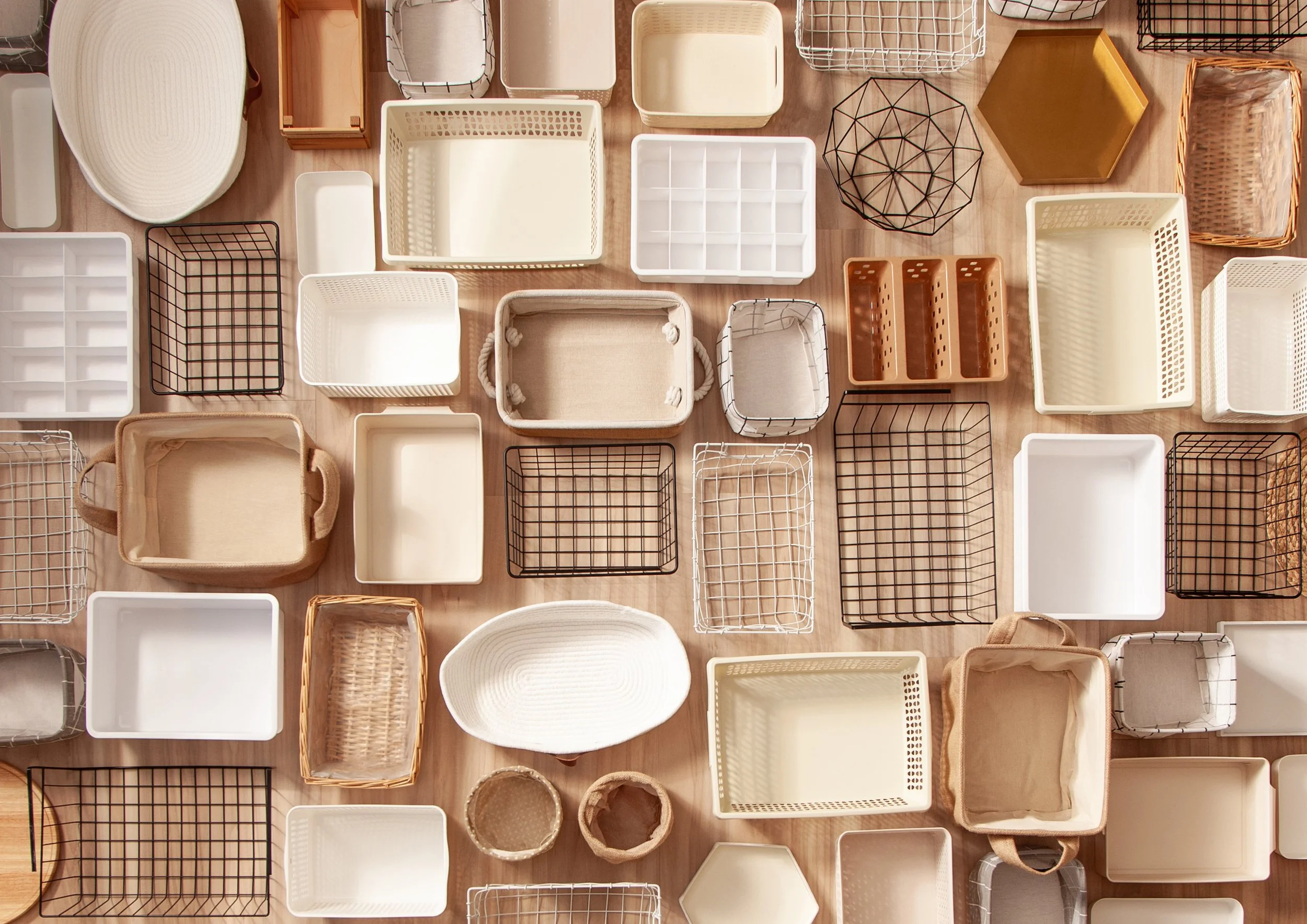 Organizing bins, baskets, and storage containers used to create functional home organizing systems