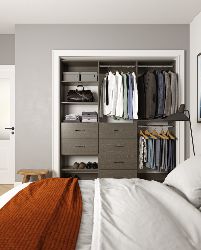 Open closet with hanging clothes, shelves with boxes, folded towels, shoes, and a bedside lamp in a bedroom.
