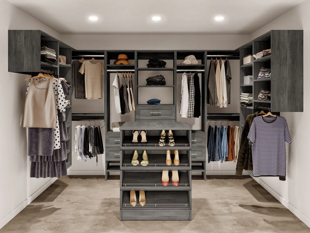 Organized walk-in closet with shelves, hanging clothes, and a central shoe storage rack.