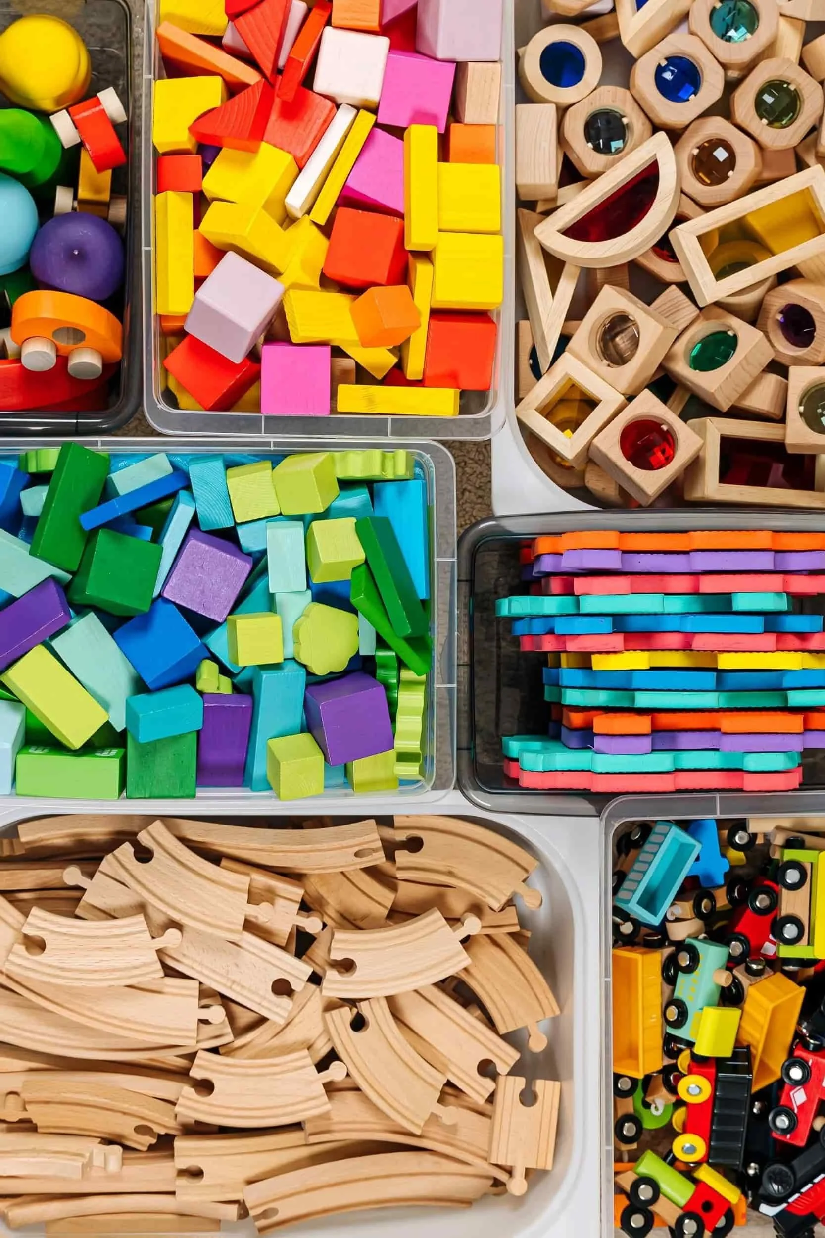 organizing toys into clear bins so you can easily find them