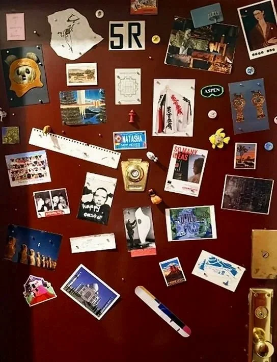 Entryway to my apartment. Magnets, ticket stubs and sketches. Ephemeral  scraps collected  and collaged.