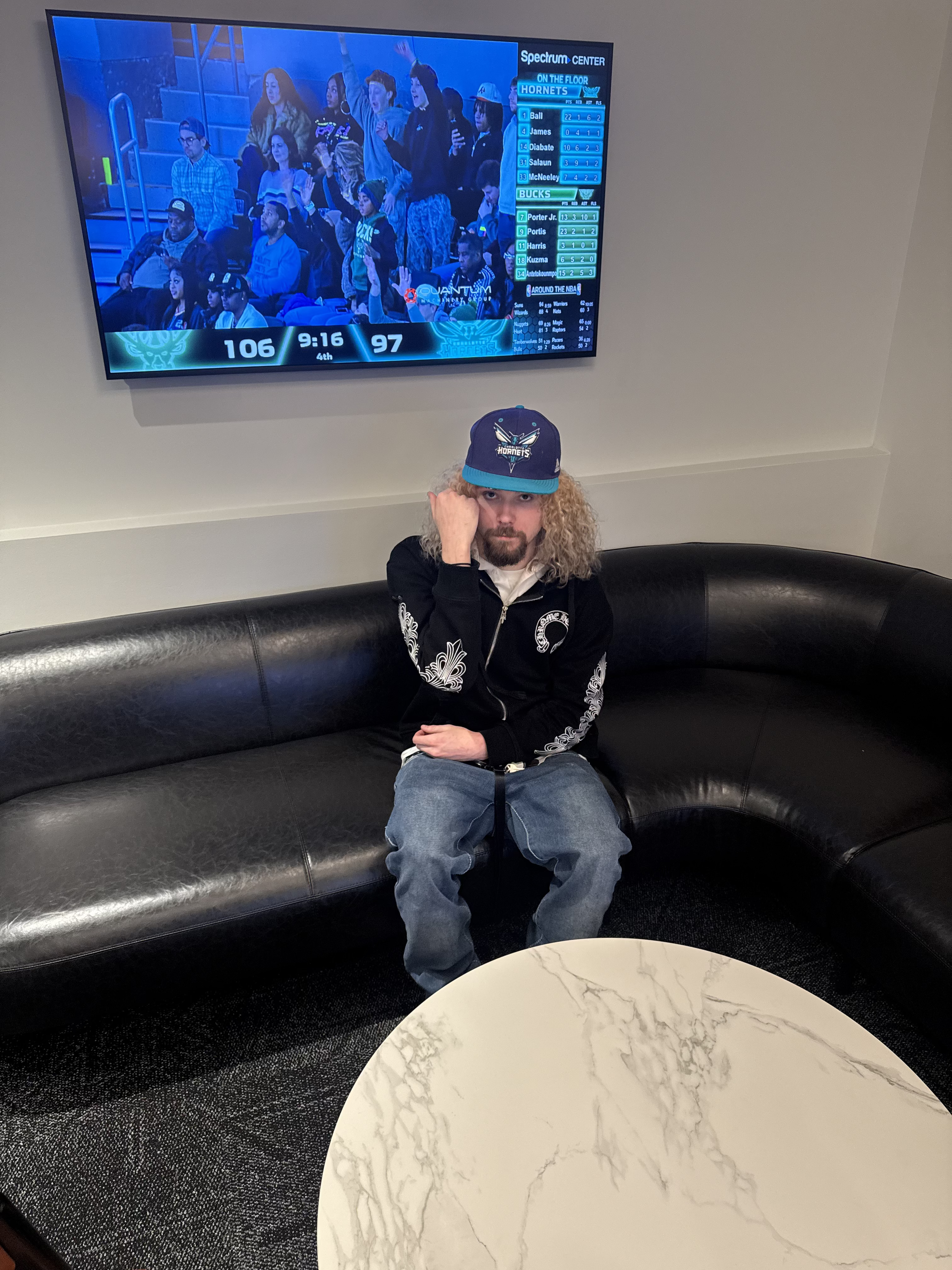 Ainsley4x pictured at the Spectrum Center in Charlotte, NC, watching the Charlotte Hornets play the Milwaukee Bucks, on December 29th, 2025. Image captured by Jahsia4x..