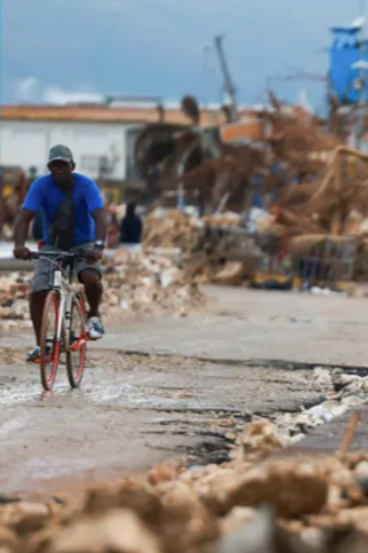 Community impact in Jamaica following Hurricane Melissa, showing storm damage and recovery efforts
