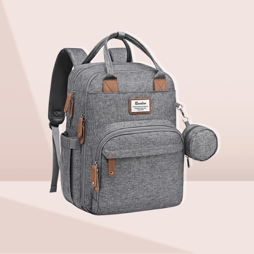 RUVALINO Diaper Bag Backpack in grey durable fabric with multiple compartments and a matching pacifier case for organized baby travel.
