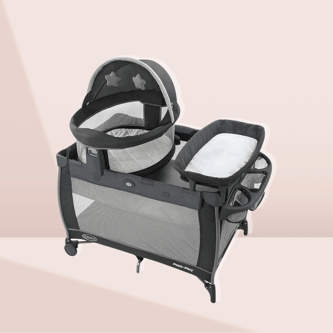 Graco Pack 'n Play Dome LX Playard in dark grey with an integrated portable baby bassinet and changing station for easy travel sleep.