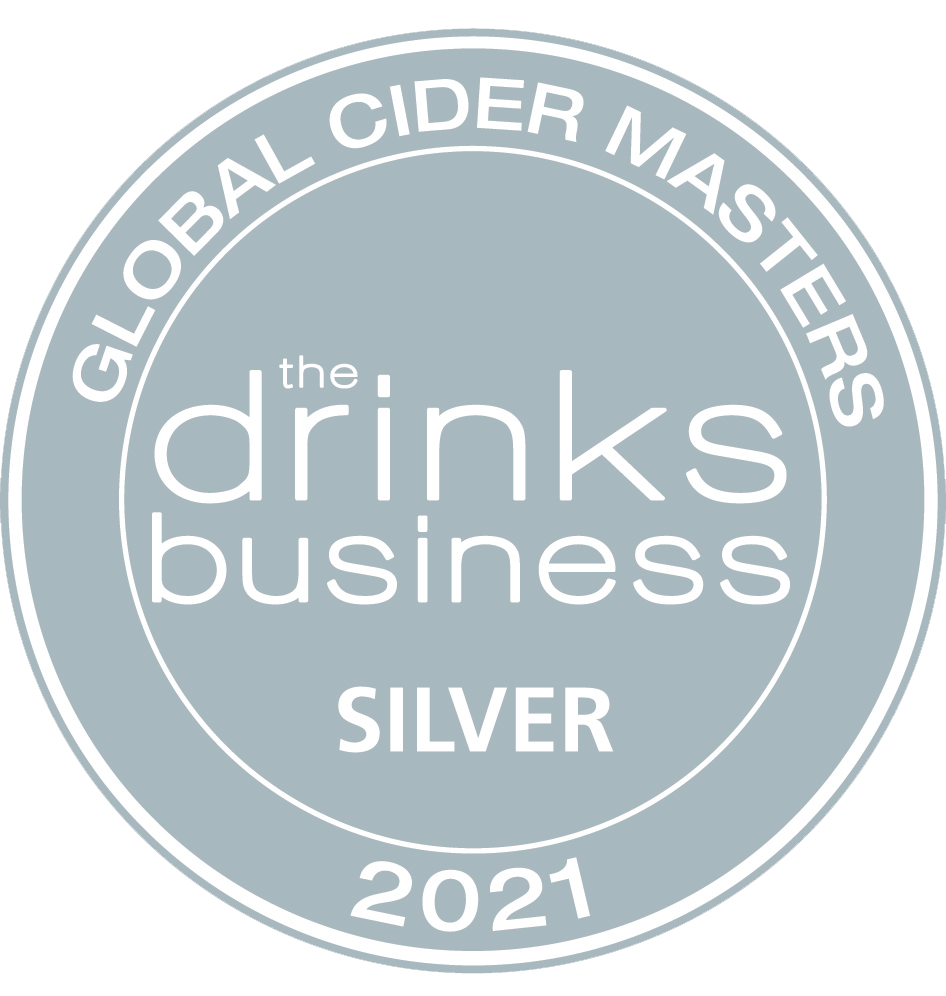 A silver circular badge with text indicating it is an award for the global cider master's drinks business in 2021.