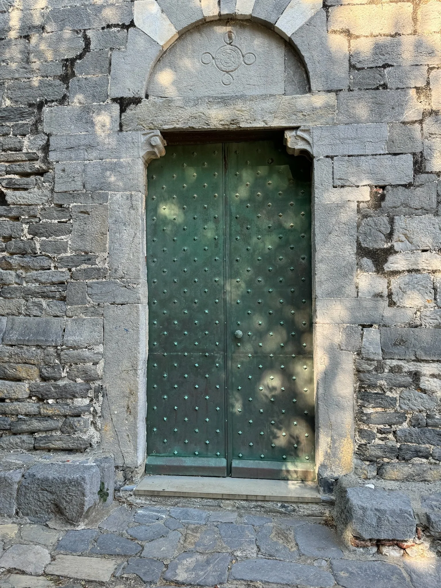 An album of green doors of Portovenere, Italy, shared by my dad during his honeymoon in 2024.