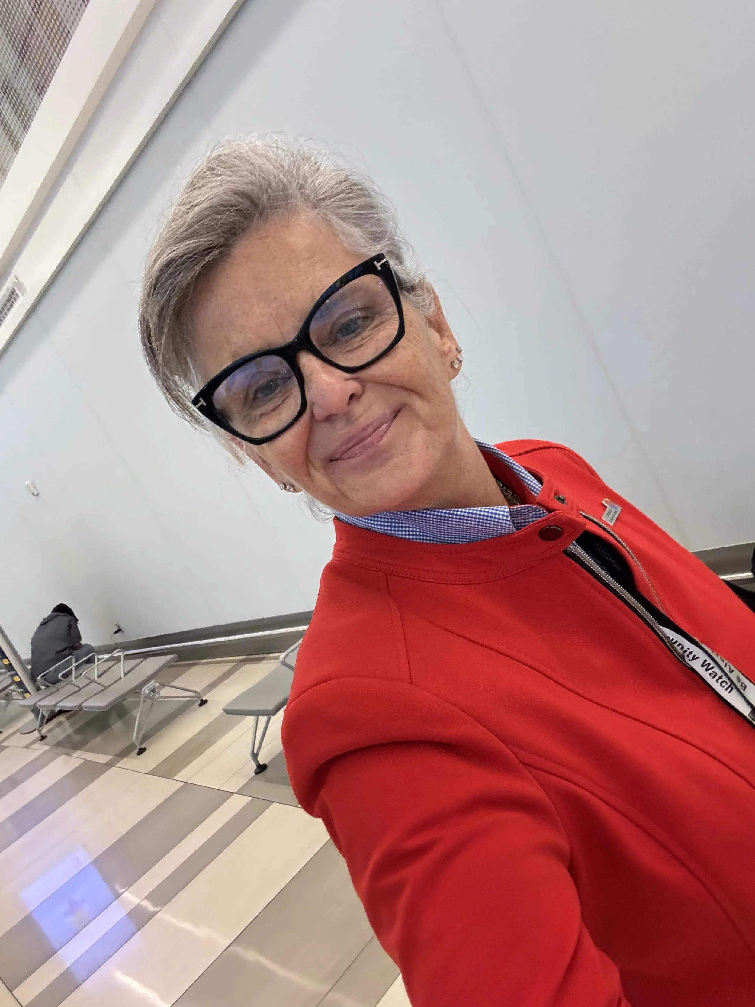A Southwest Airlines airplane flying in the sky with cloudy weather.