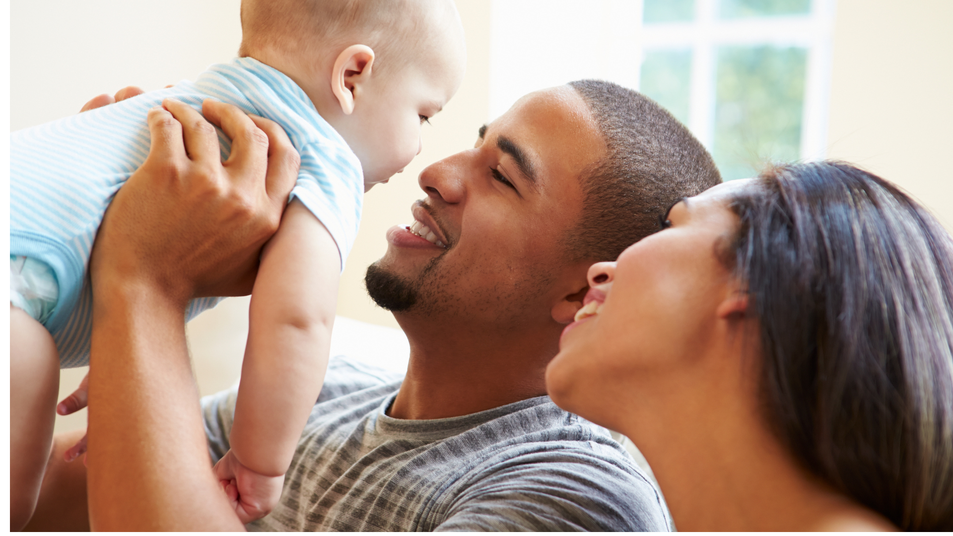 Parents with their baby, representing family-centered healthcare.