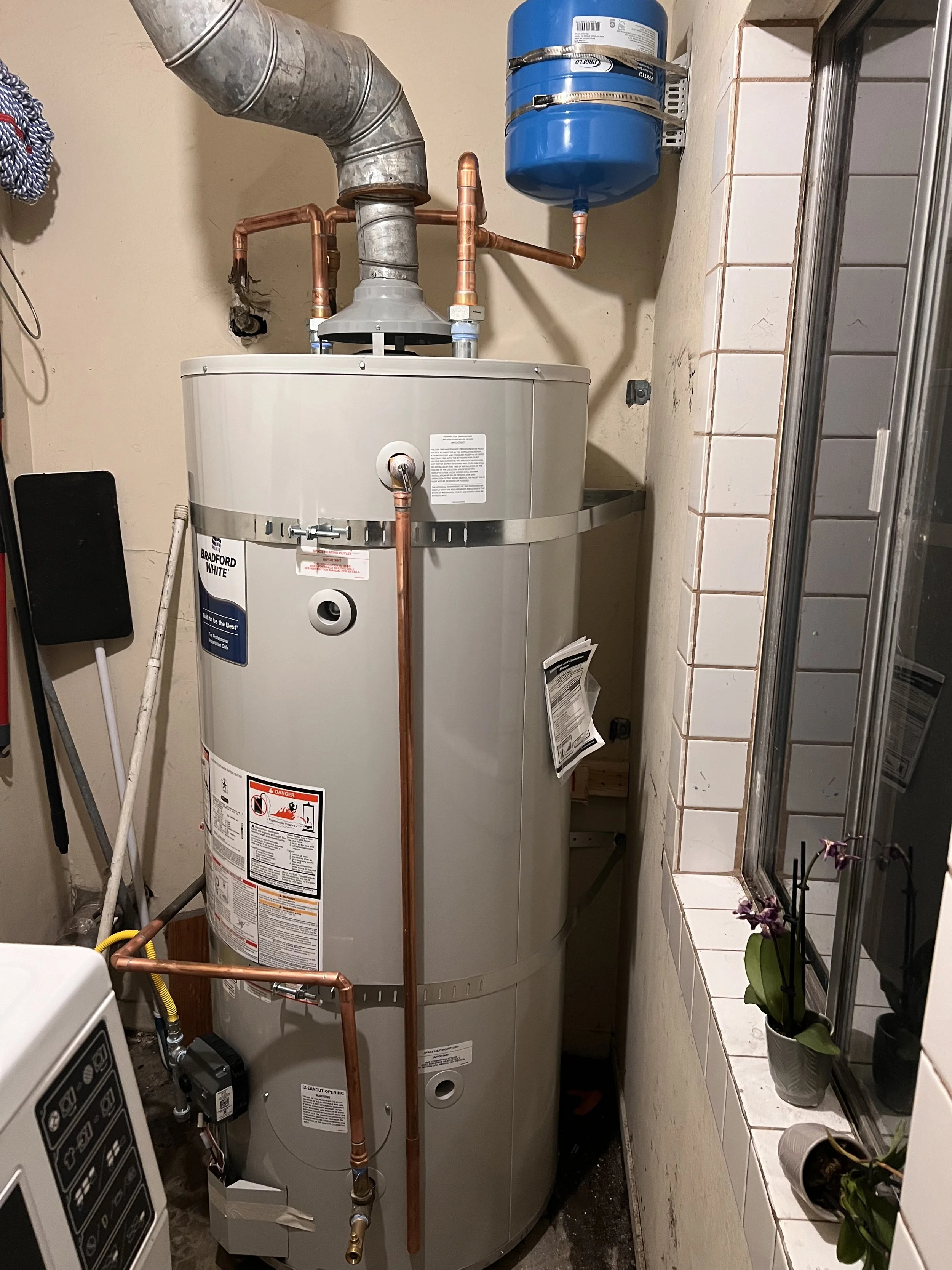 Standard water heater installation by Evolution Plumbing in Watsonville, CA.