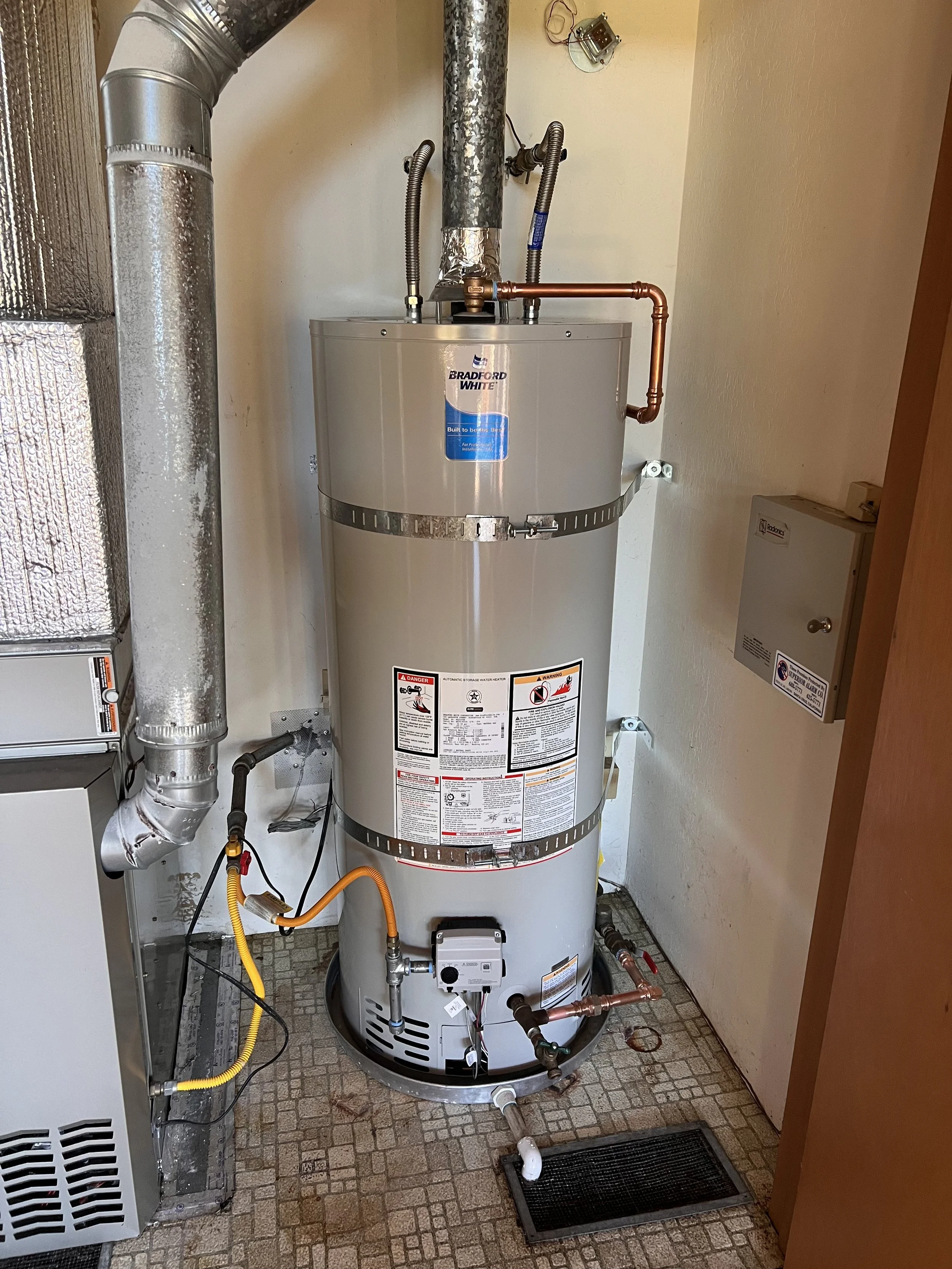 Standard water heater installation by Evolution Plumbing in Watsonville, CA.
