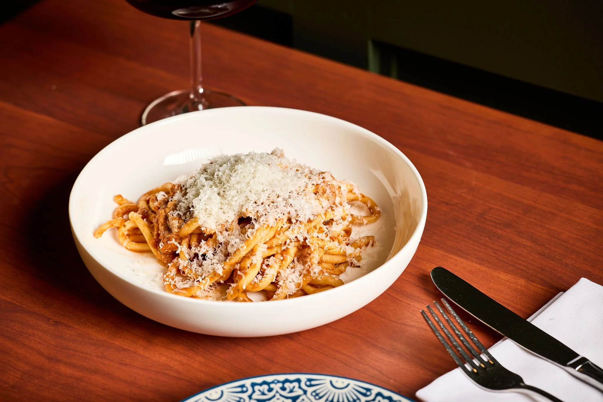 house-made pasta pomodoro and red wine
